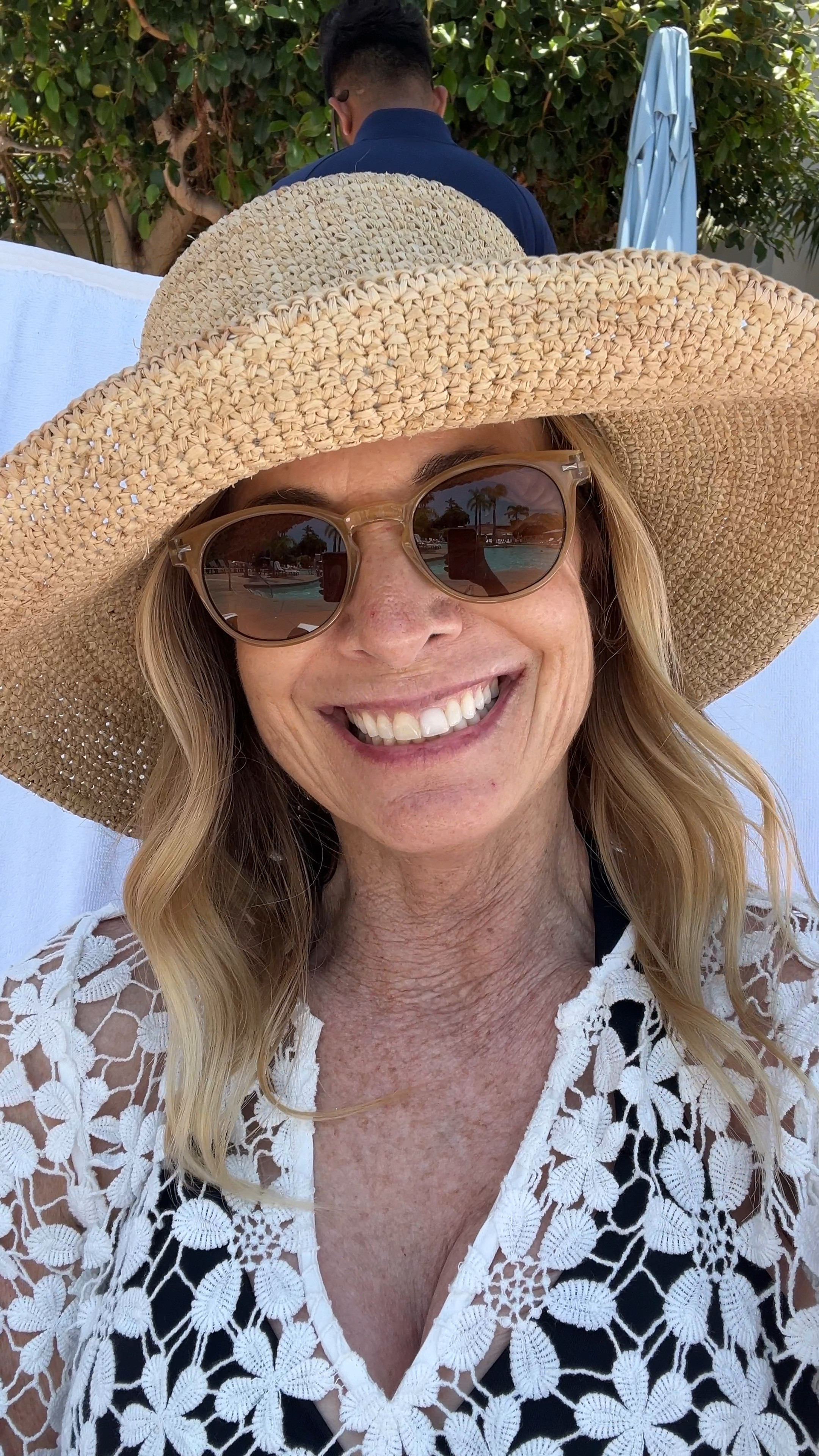 Lounging by the pool. Sunglasses and reading glasses in one. And the best raffia beach hat. 

#LTKVideo #LTKSeasonal #LTKOver40