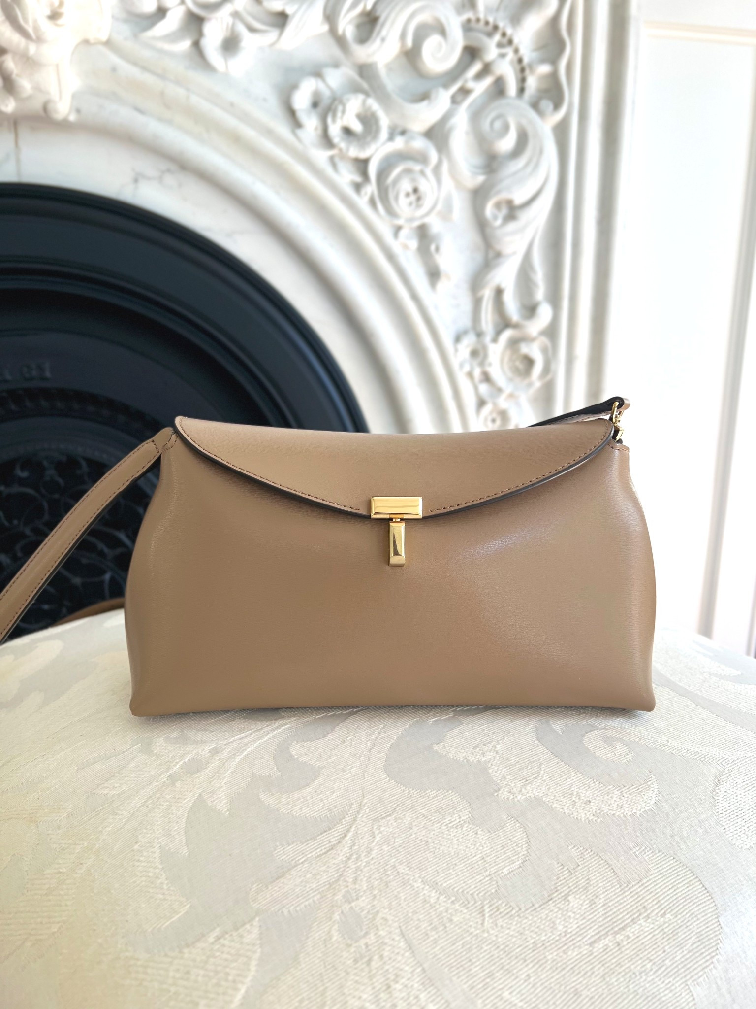 TOTEME t-lock clutch is my go-to mom bag and a quiet luxury find. You can use as crossbody or as a clutch. So many fashion editors have it. A good under $1000 bag! Also linking a look for less  

#LTKItBag #LTKStyleTip

#LTKStyleTip #LTKItBag