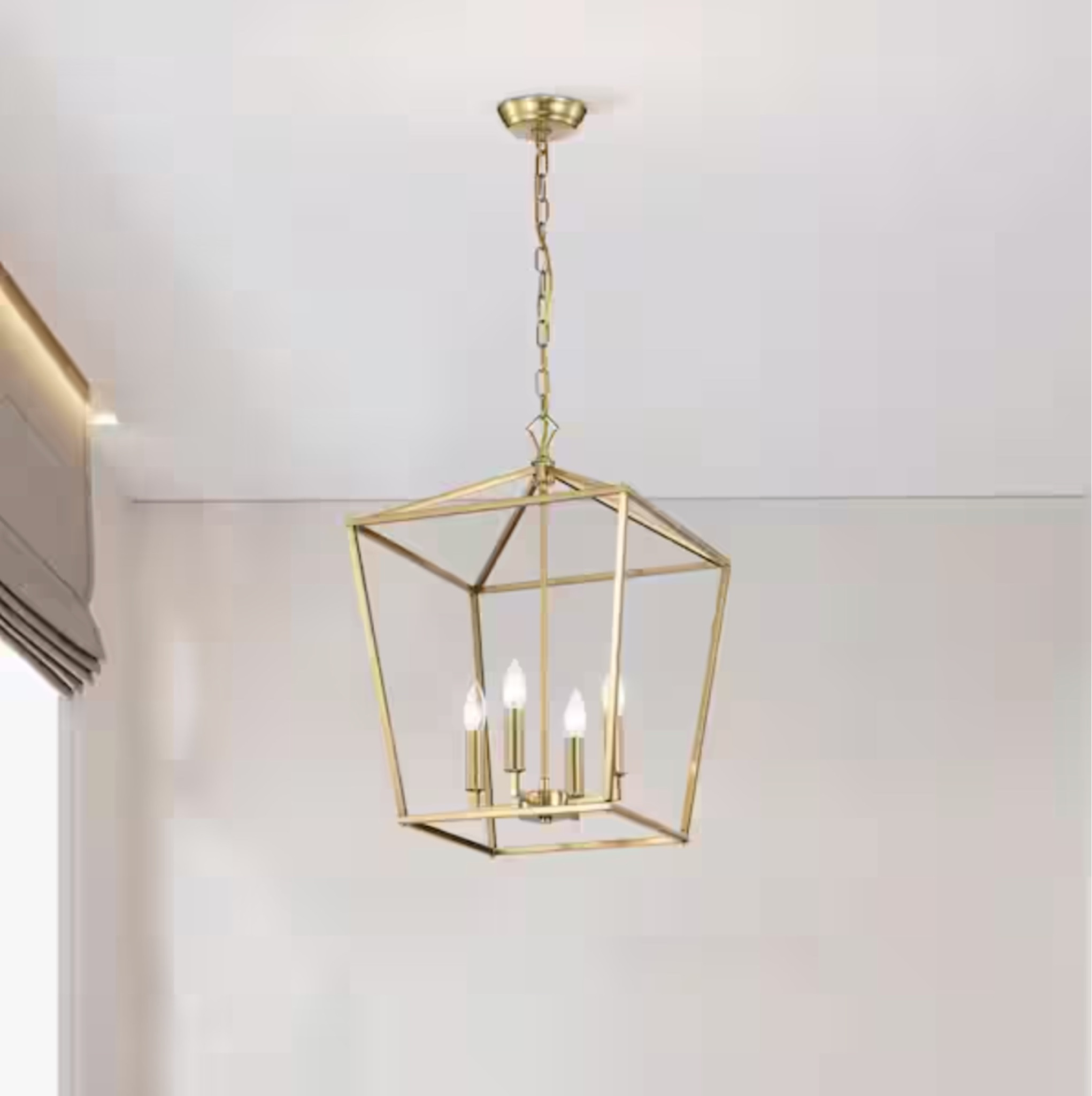 Renzo 4-Light 16 in. Gold Caged Lantern Modern Pendant

As a gold variation of the popular Renzo collection, this lantern pendant meets modern farmhouse with elegance. The open cage design creates a striking geometric silhouette. With four candelabra bulbs (not included), the pendant light provides ample illumination. Add 2 or more over a kitchen island or dining table for a bold statement. Shorten the 40 in. chain to your desired hanging height by removing links.

#LTKHome