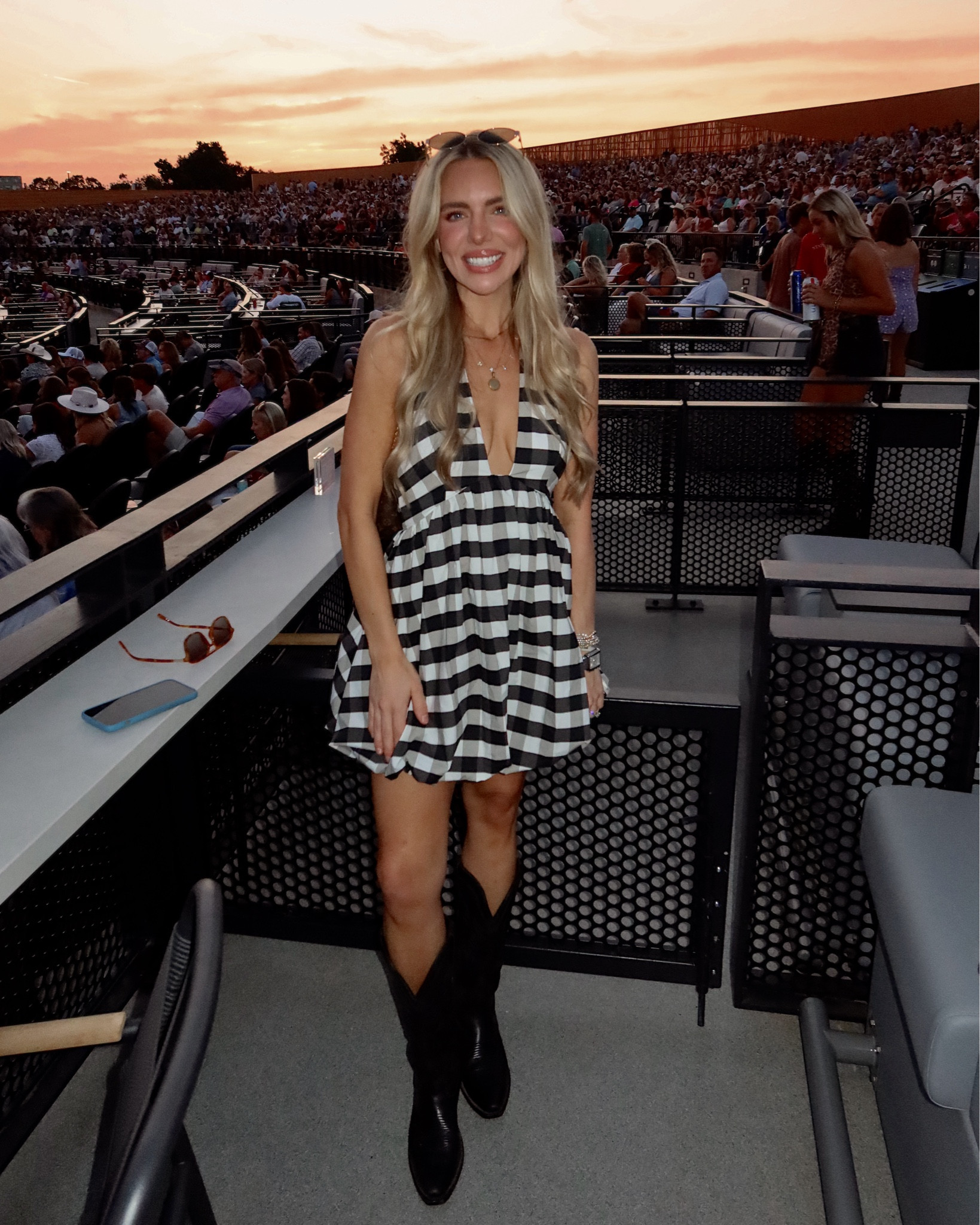 THE CUTEST ever little bubble halter black and white gingham dress, perfect for country concert dress and gameday dress!!! Worn with my black classic tecova boots on sale!!! So flattering! XS

USE THIS LINK for $25 off! https://refer.tecovas.com/courtneymantooth 

#LTKU #LTKPetite #LTKSeasonal