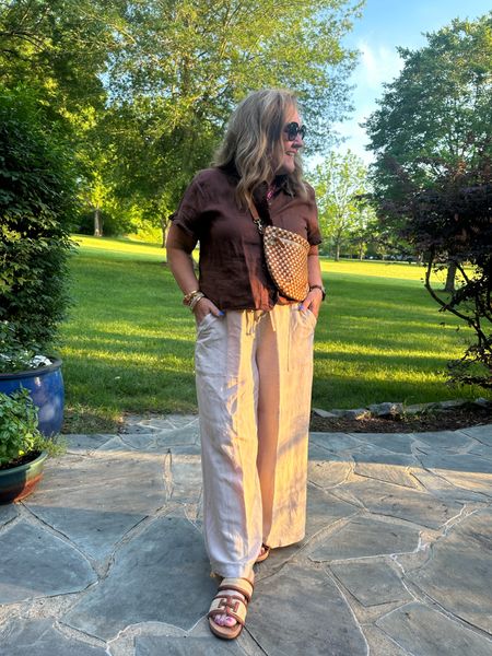 A favorite hot weather look is loose fit linen pants and blouse. 
Blouse size large/12 comes in several colors 
Pants size large. Linen blend
Loving my new shoes! Pretty comfy! 
And my sling bag. Well it’s an outfit maker. Strap adjusts so you can wear it as a Fanny pack too. 

Summer outfit linen pants linen blouse loft JCREW ClareV Sam Edelman 

#LTKFindsUnder100 #LTKShoeCrush #LTKOver40