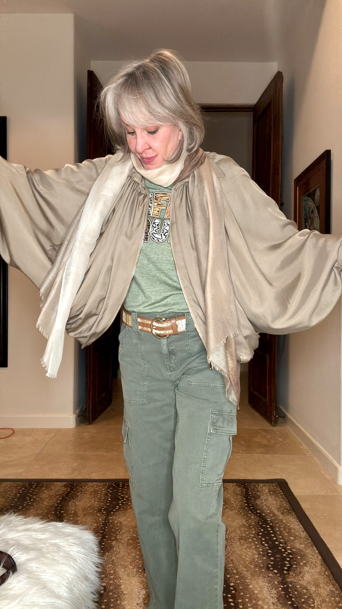 Womens Puffed Bomber Jacket Casual Batwing Sleeve Lapel Collar Zip Shirts Oversized Pleated Streetwear Jackets.
Comes in 5 more colors. I am wearing a size medium.
Graphic tee shirt Safari Squad
Designer shoes 
Belt

#LTKTravel #LTKFindsUnder50 #LTKOver40