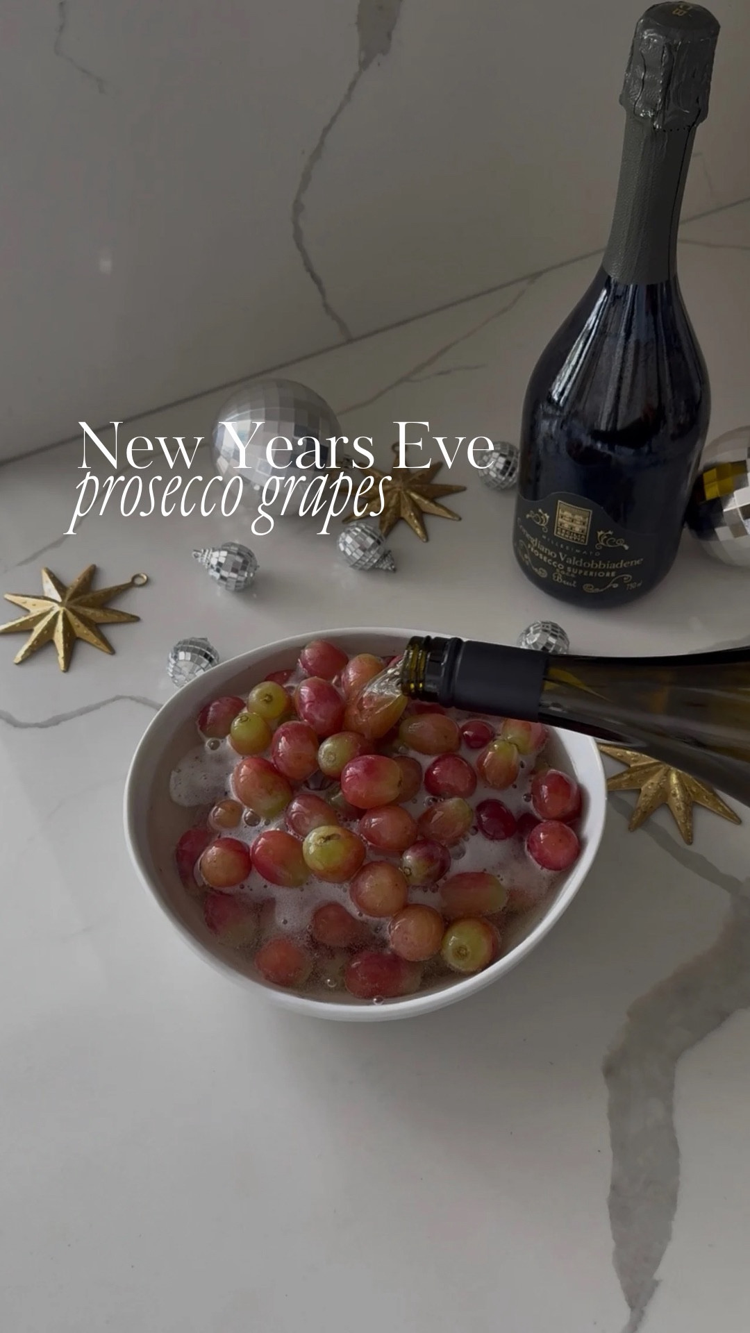 NYE treat, but make it chic ✨🍾
Frozen prosecco grapes are always a yes 🍇 comment GRAPES for links ✨

You need: 
1 lb grapes
1 cup Prosecco
2/3 shots of vodka
Sugar 

How to:
Soak grapes in prosecco + vodka overnight, drain, sprinkle with sugar, freeze & serve your 12 grapes 🥂

#NYESnacks #ProseccoGrapes #EntertainingAtHome #NYECocktails #neeyearseve #grapes #proseccograpes #vodkagrapes #2026 #nye2026 #hosting

#LTKHoliday #LTKHome #LTKSeasonal