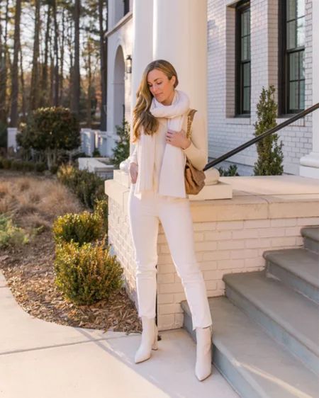 Winter white outfit 🤍 This white scarf is the cloudiest, softest one you’ll ever own, and my white boots are very comfortable for all day wear. Similar sweater linked, jeans run TTS.

#LTKstyletip #LTKSeasonal