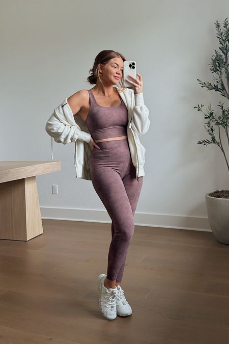 i ordered these @nikewellcollective items during pregnancy & i’m still feeling great in them postpartum! the material is so soft & stretchy. i’m wearing a small in the sports bra, a medium in the leggings & a xs in the jacket. #teamnike #ad