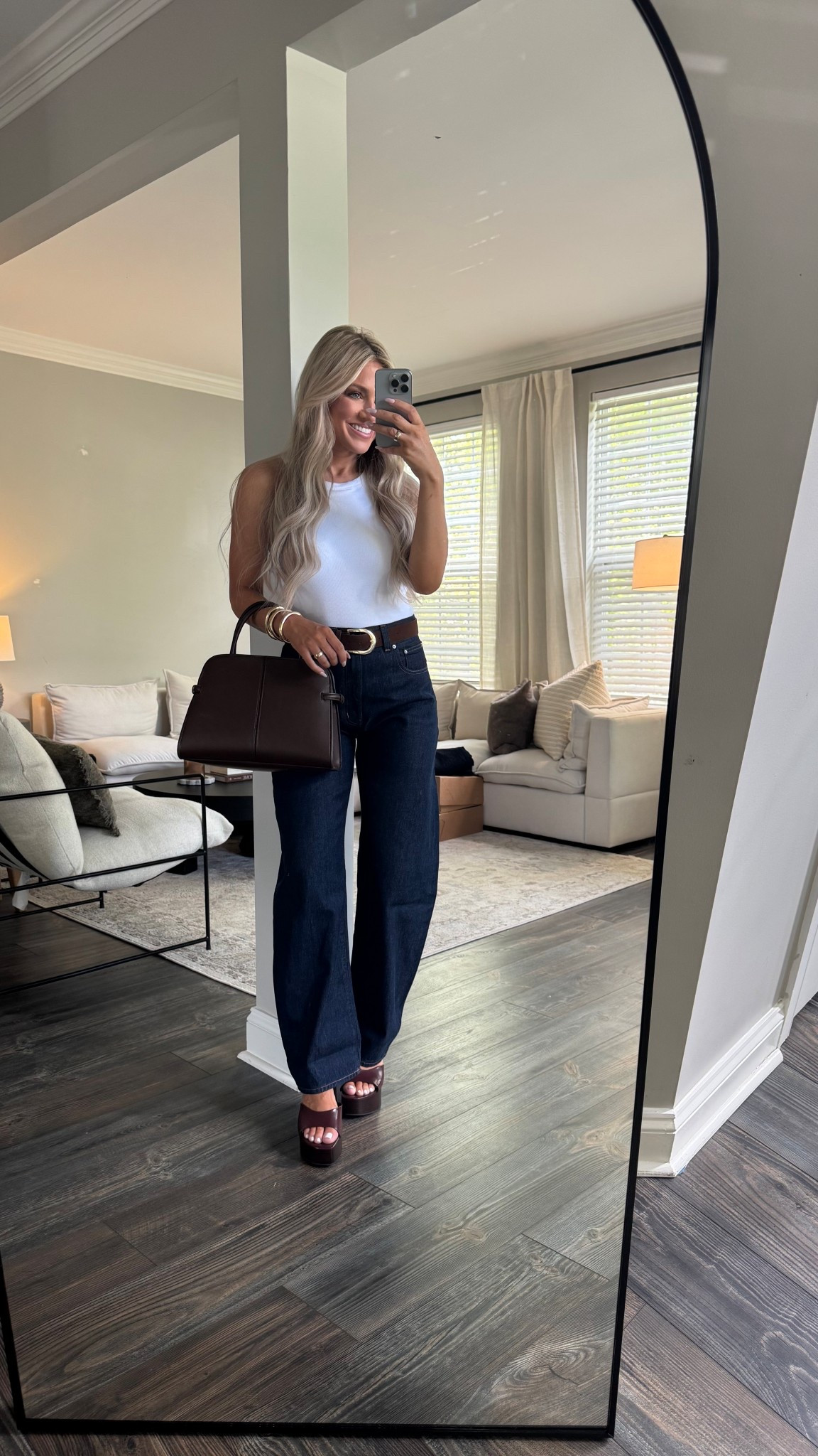 Early fall transition look- dark wash jeans, tank, and fall colored accessories! 

#LTKFindsUnder100 #LTKStyleTip #LTKSeasonal