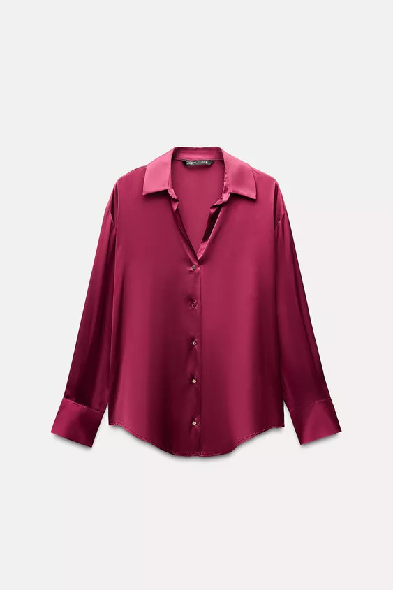 Flowing long sleeve shirt featuring a lapel collar, V-neckline and front fastening with golden bu... | Zara US