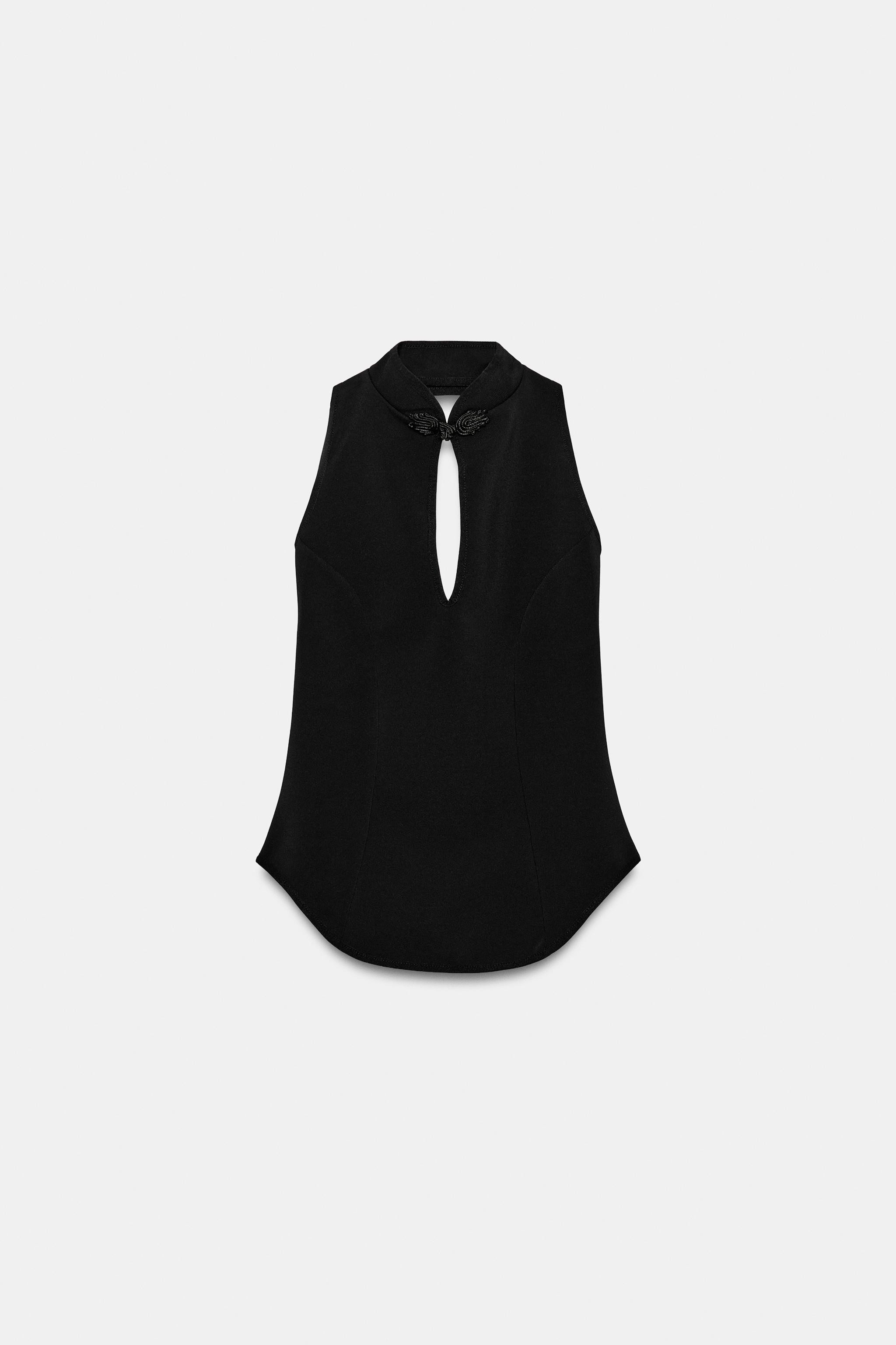 Gr\u00f6\u00dfe des Models: 181 cmTailliertes Neckholder-Top mit V-Ausschnitt. R\u00fcckenfrei. V... | Zara DE