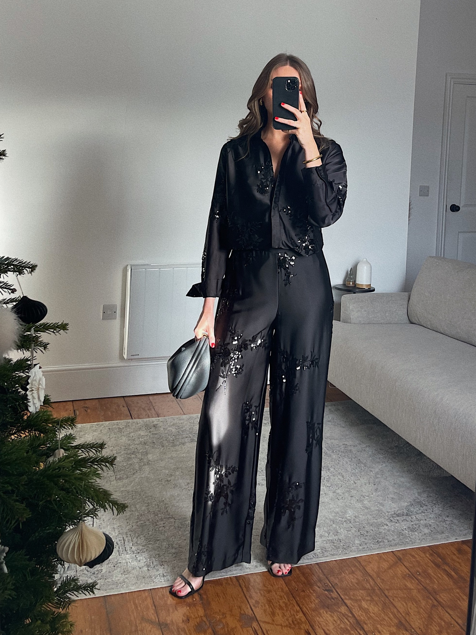 Dressy Christmas Day outfit ideas
New look satin sequin black shirt and matching trousers
Wearing an 8 in the shirt, size 10 in the trousers
I’m 5ft 6
& other stories black barely there heels
Songmont Luna bag 



#LTKeurope #LTKHoliday #LTKSeasonal