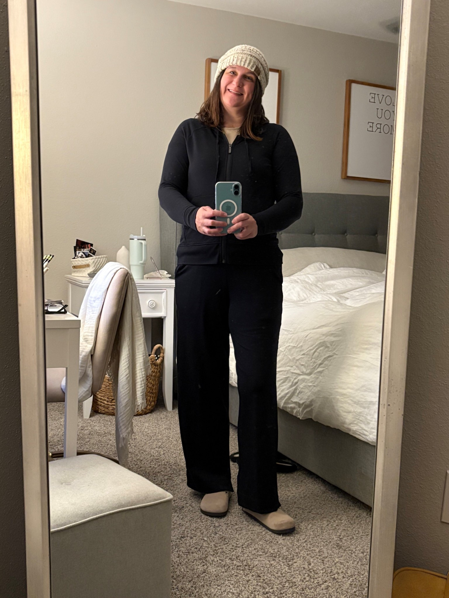 Cozy coastal style for cool mornings.
Black zip-up jacket, wide-leg lounge pants, a cream knit beanie, and neutral clogs — the perfect casual fall outfit for coffee runs, travel days, or slow weekends at home. Comfortable, classic, and effortlessly pulled together.

#LTKootd #LTKOver40 #LTKMidsize