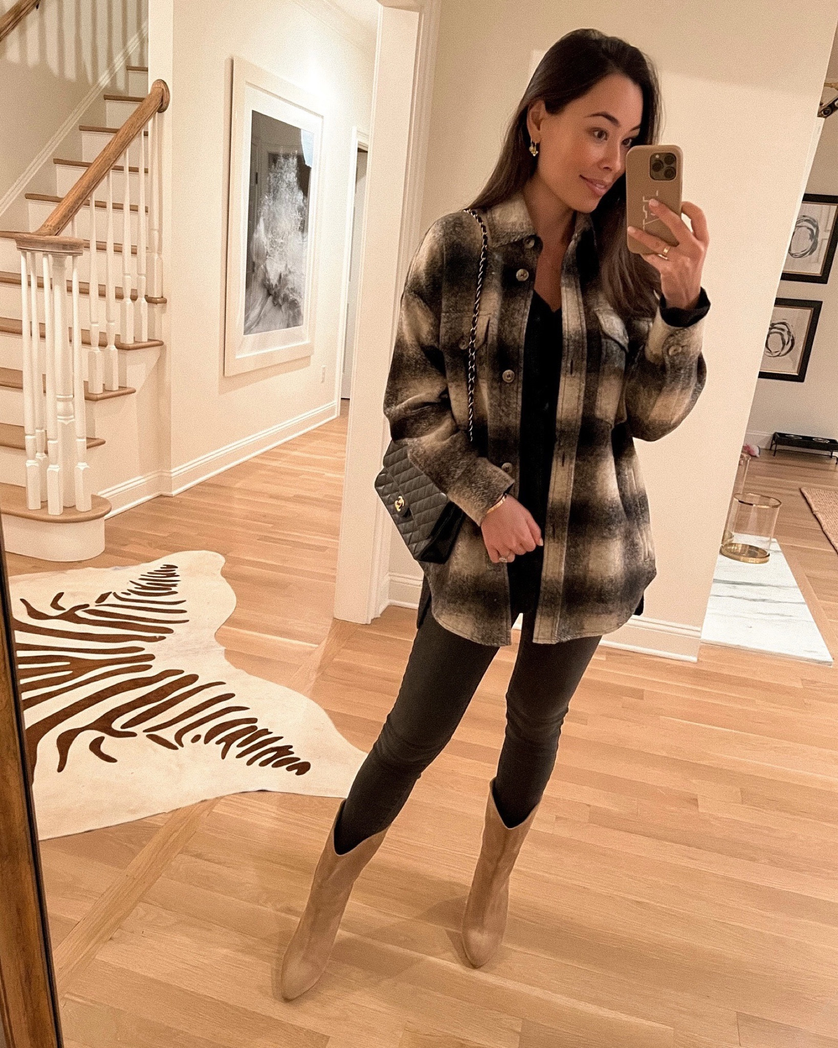 Kat Jamieson of With Love From Kat wears a winter outfit. Plaid shacket, cashmere sweater, dark grey denim, suede booties, Chanel bag, classic style, neutral style. 

#LTKshoecrush #LTKSeasonal #LTKstyletip