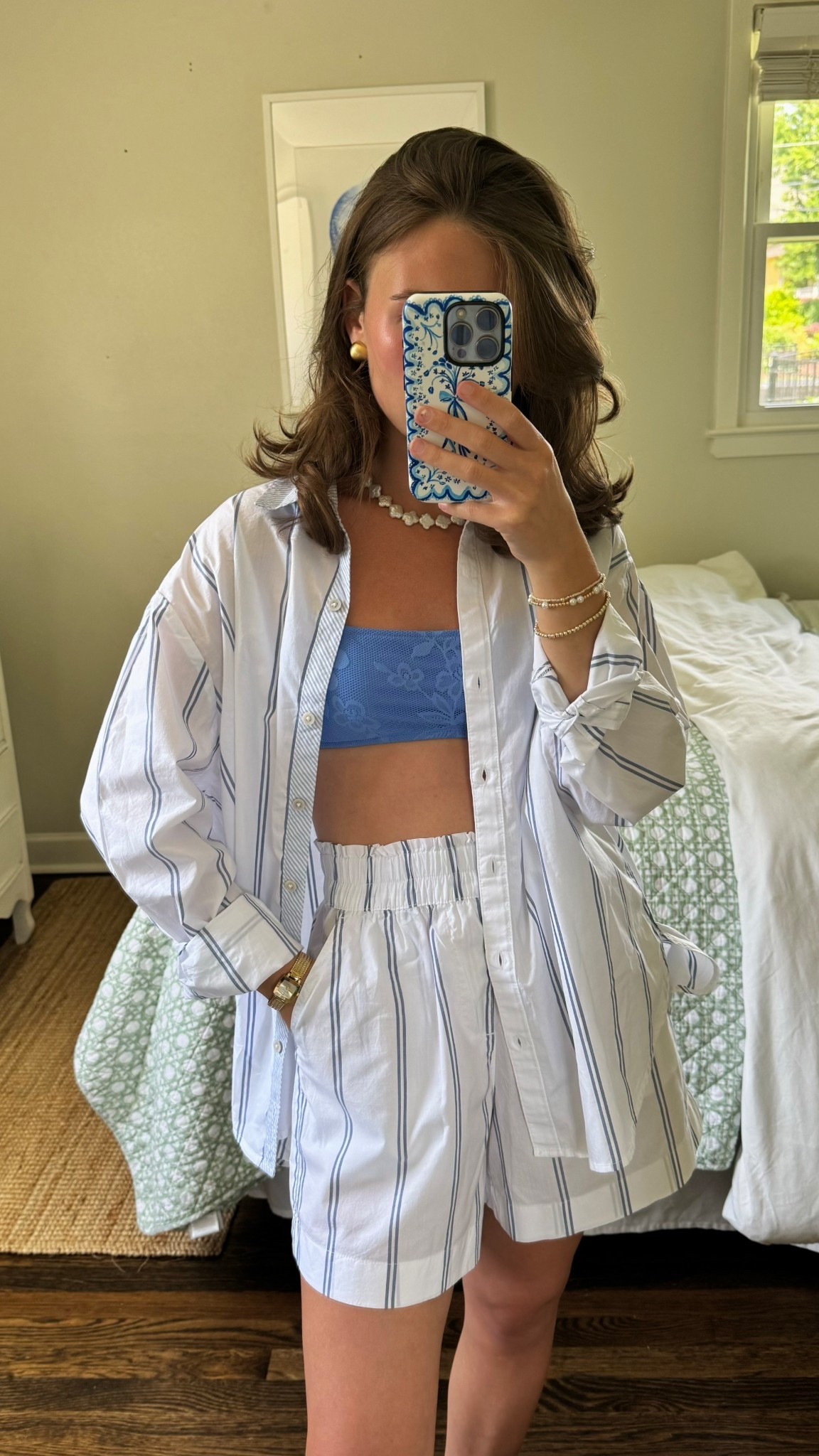 Under $40 set! Wearing xs (usual size) and I’m 5’2”. The top fits over sized and the shorts have a nice long inseam & fit great! As for the swimmie, I’ve linked it too! I’m wearing xs in that as well. #summerset #coastalstyle 

#LTKFindsUnder50 #LTKSummerEdit #LTKSaleAlert