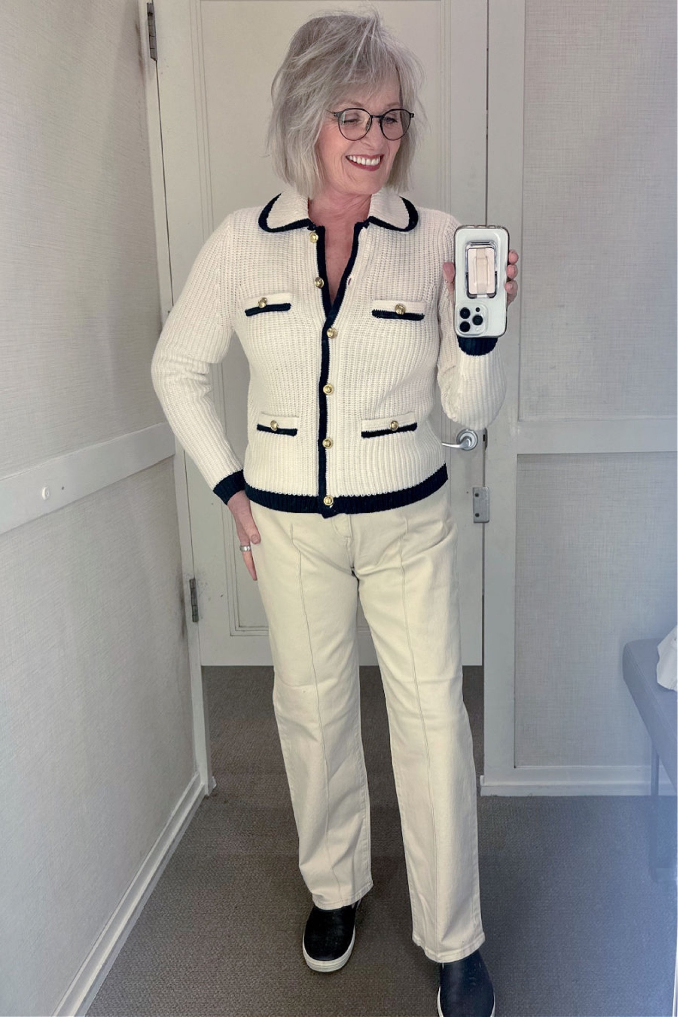 Loft did a great job with this Chanel-inspired sweater jacket. It has an all-over ribbed knit with gold buttons and dark piping along the front, collar, and pockets. The piping is such a dark color that I couldn’t tell if it was black or deep navy, so it would work with either. It comes in regular and petite sizes. I love the ecru color of these pin tucked jeans. They have a straight-leg and just enough stretch to make them very comfortable. They come in regular and petite sizes.

#fashion #fashionover50 #fashionover60 #springfashion #loft #loftfashion #straightlegjeans #ecrudenim #offwhitedenim #chanelinspiration #cardigan #knitcardigan #knitjacket

#LTKstyletip #LTKfindsunder100 #LTKSeasonal