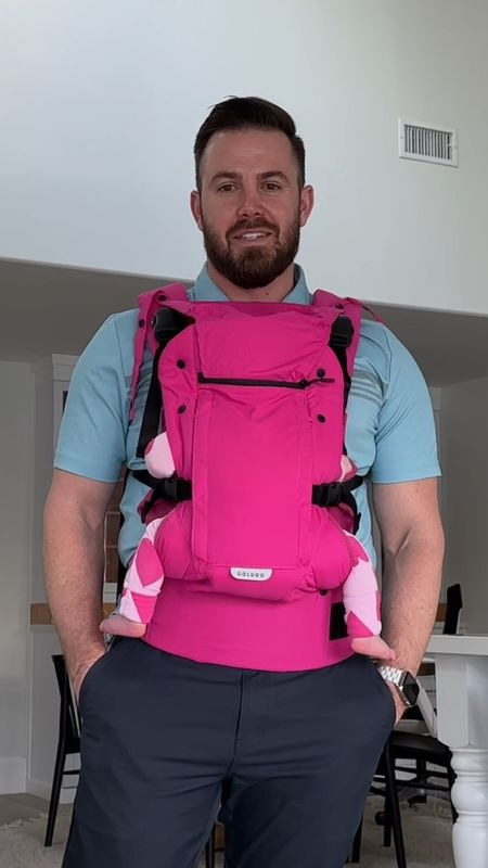 We love this baby carrier - it comes in a bunch of colors and has a little sun shade on top! #babycarrier #colugo #parenting #babies #babygear #babywear 