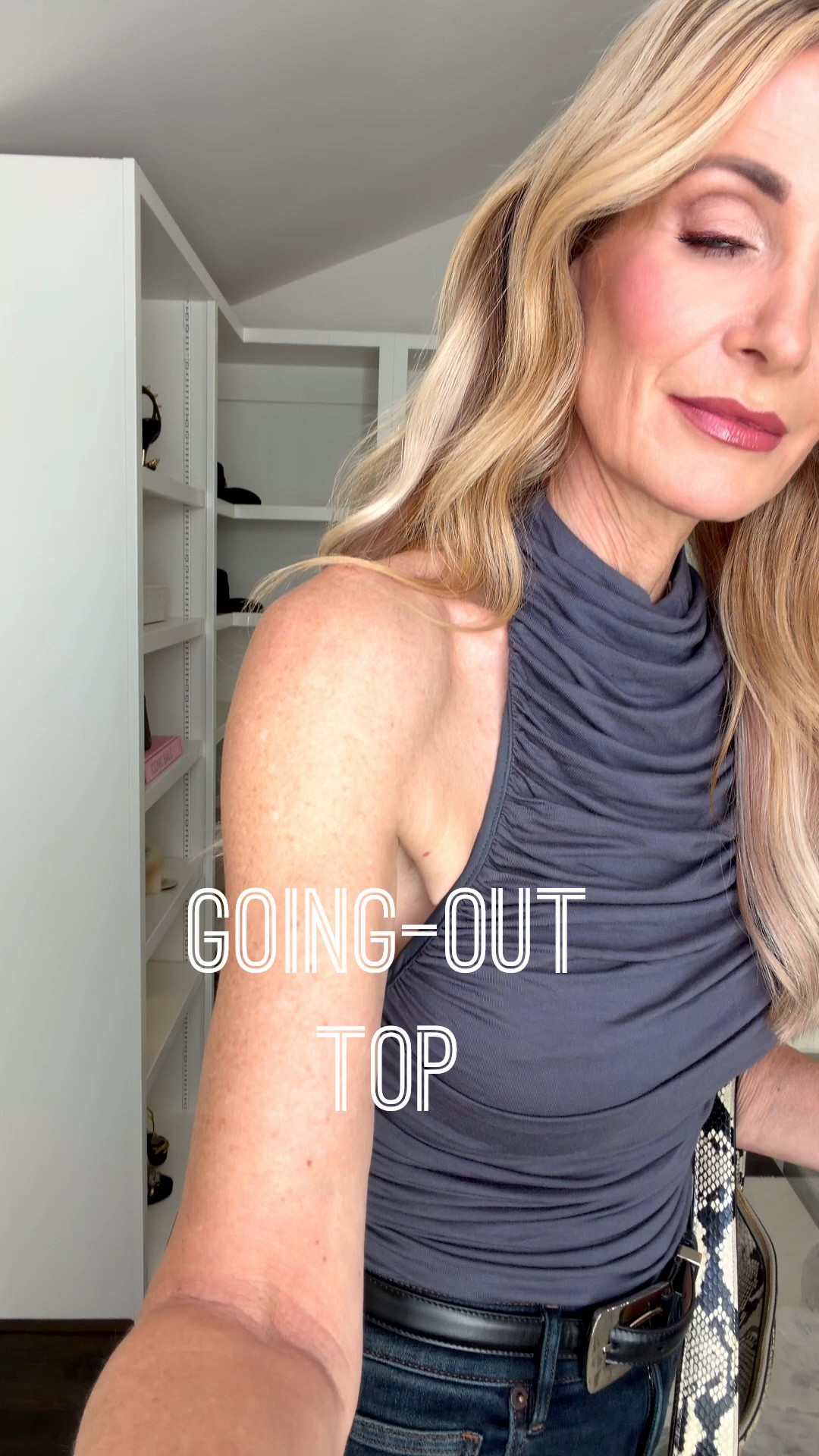 This gray Revolve halter top is such a great going-out top! I love the ruching, and it looks fabulous with these flattering, slimming Veronica Beard jeans. The dark wash is the perfect mix of navy and black for date night or a girls’ night out. I’m wearing an XS in the top and a size 24 in the jeans. #GoingOutOutfit #DateNightStyle #HalterTop #VeronicaBeardJeans #DarkWashDenim #GirlsNightOut #WomenOver40Style #LTKootd #LTKOver40 

 