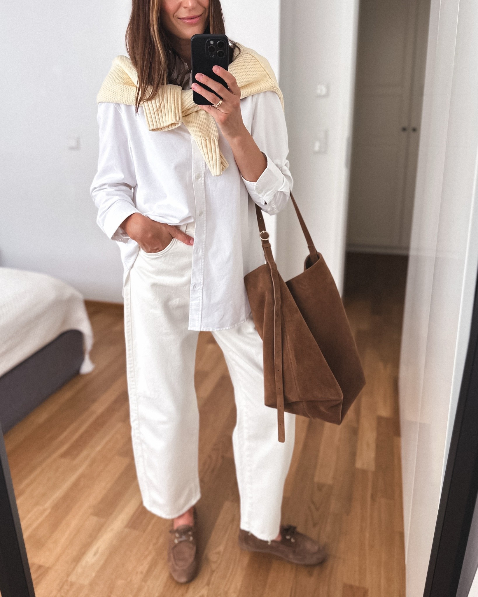 Spring outfit:
- Oversized cotton button-up (size down, wearing the small)
- relaxed barrel-leg denim (wearing 26/30)
- a butter yellow knit worn over the shoulders (oversized fit, wearing medium)
- and suede accessories in warm camel tones.
