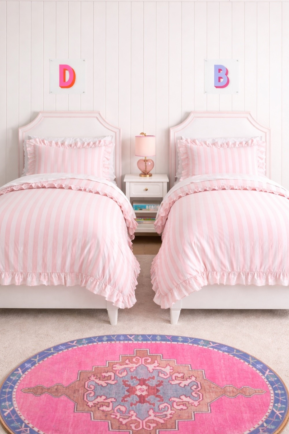A sweet, polished bedroom design that blends classic upholstered details with soft pink stripes for a charming look your girls with grow with. 
🖤🖤
Girls room, girls bedroom, kids room, kids bedroom decor, shared bedroom, shared girls room, shared kids room, pink bedroom, girls room rug, girls room wall art, girls room lamp, girls room decor ideas, girls room bed, girls room nightstand, kids bedroom design, home decor, home accessories, pottery barn teen, wayfair 


#LTKHome #LTKSaleAlert #LTKKids
