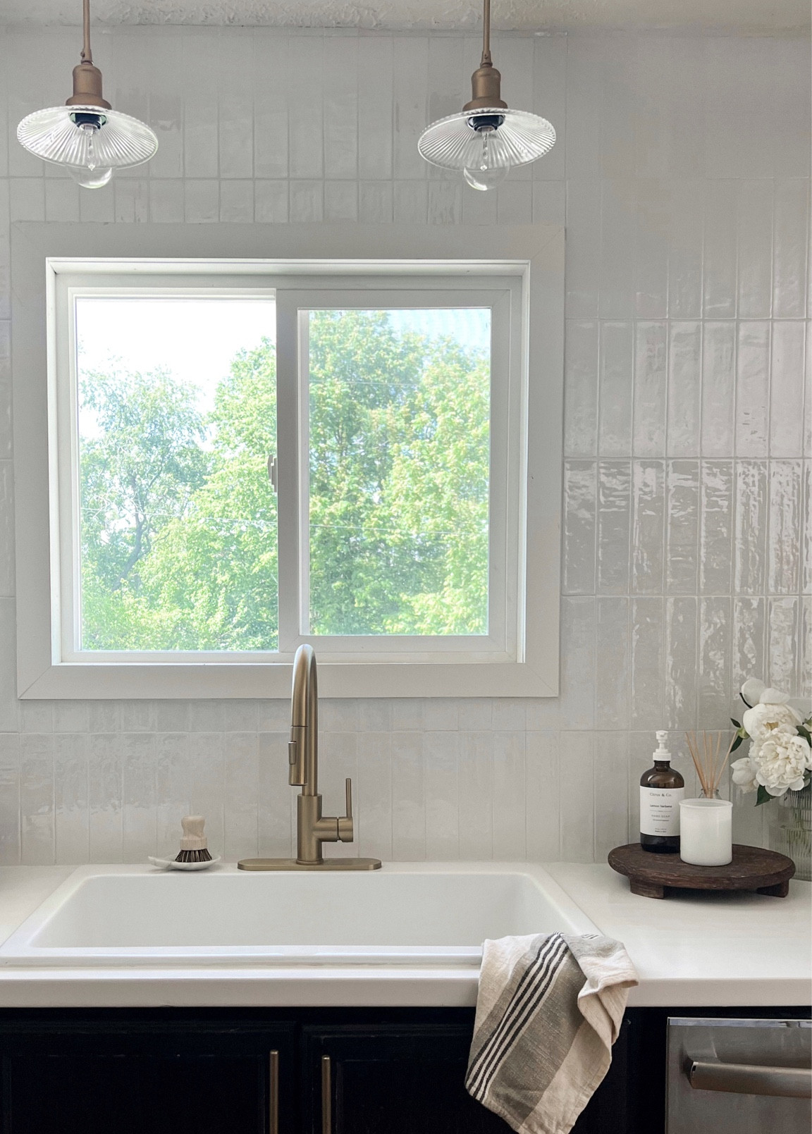 Organic modern kitchen - my sink styling 

Wood tray McGee & co neutral kitchen kitchen decor founditonamazon amazon home decor ribbed vase vase fluted vase brass faucet white tile zellige tile home decor 

#LTKFind #LTKunder50 #LTKhome