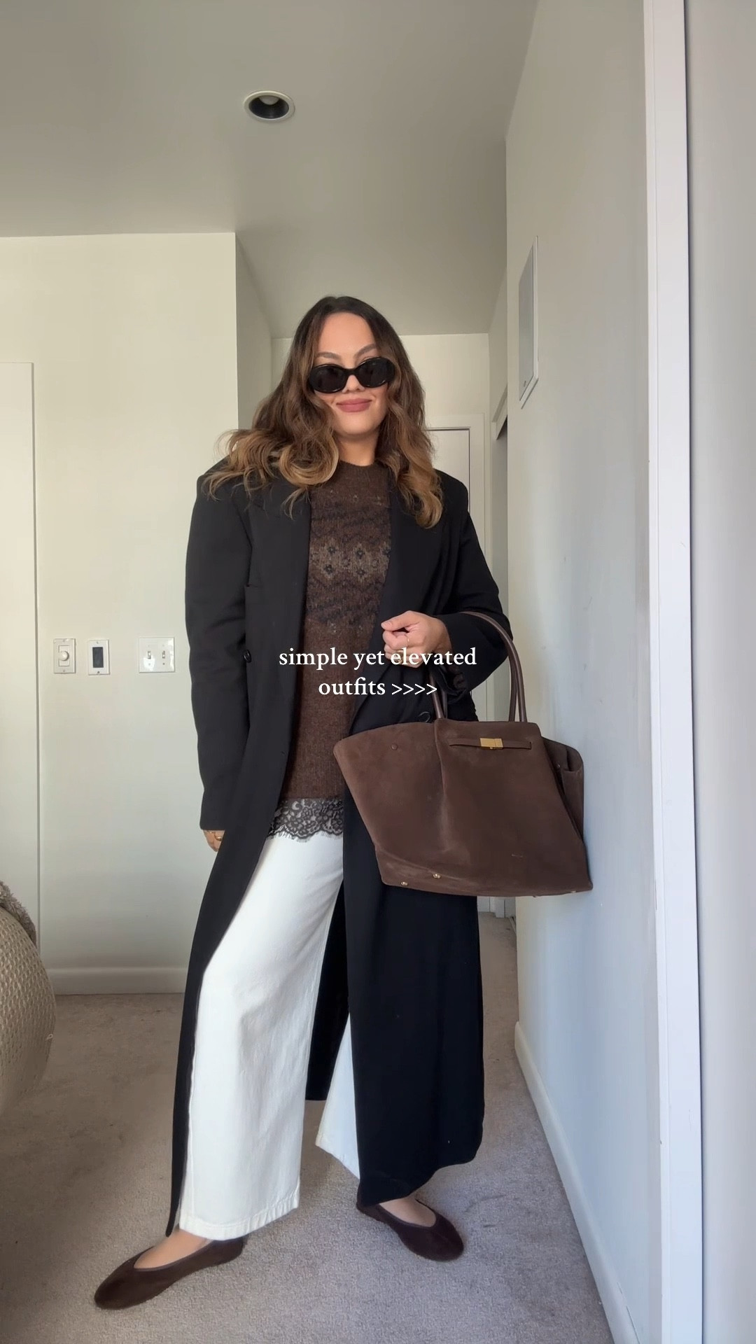 Simple yet elevated fall outfit!

-Zara brown lace trimmed cami, I have a large. 
-White barrel jeans, similar linked.  
-Black long coat, similar linked. 
-Aritzia espresso brown fair isle sweater, I have a large. 
-Steve Madden chocolate brown flats. 
-Celine Triomphe sunglasses. 
-Demellier London brown suede bag  

#LTKstyletip #LTKwinter #LTKfall