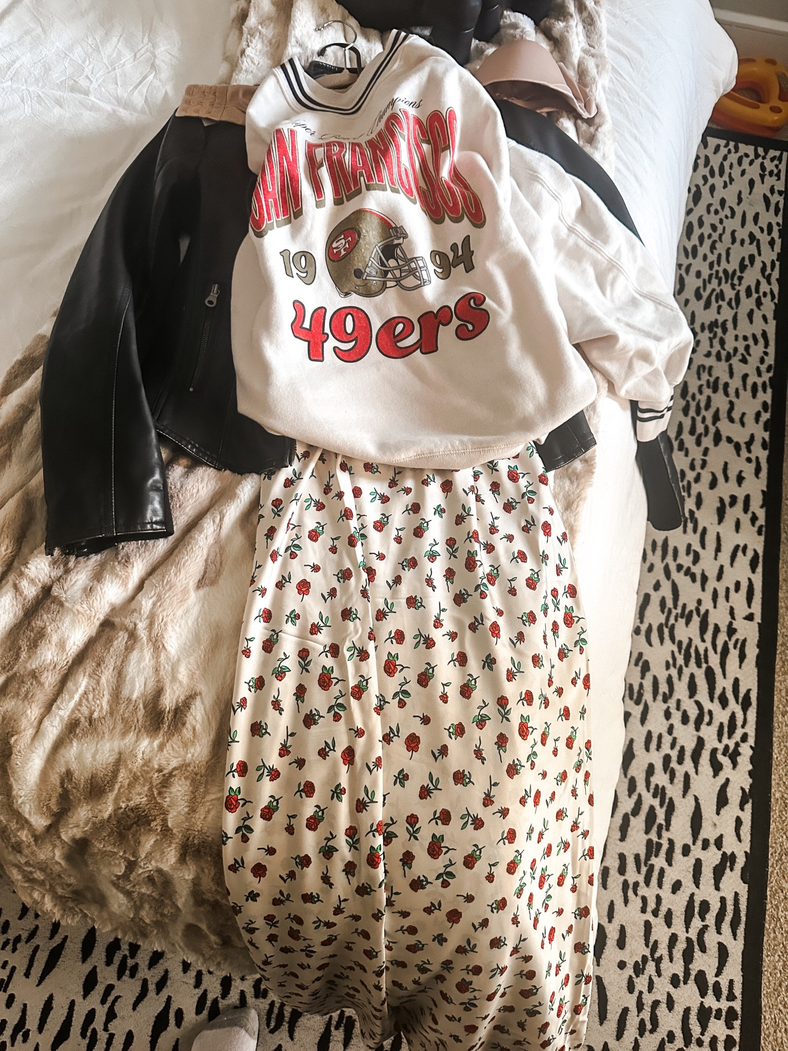 Football game watch party outfit idea - 49ers sweatshirt with silk print slip dress, leather moto jacket, sheer tights and black boots 

#LTKSeasonal #LTKStyleTip #LTKMidsize