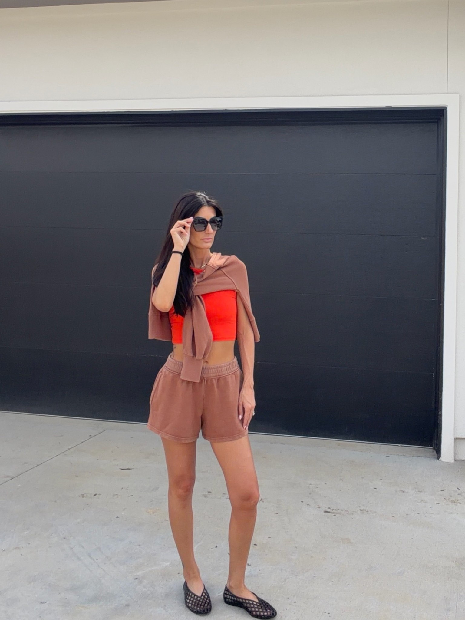 Mother’s Day ootd featuring my favorite outfit for lounging outdoors ☀️🤎

This little @Aerie matching short set is lightweight, comfy, and the brown & red combo feels so good for summer.  The shorts are relaxed & the matching lightweight sweater is perfect for layering!

An on trend matching set paired with jelly flats from Amazon is an easy yes. 

aerie lounge set, aerie real, aerie favorites, outdoor lounging outfit, comfy summer outfit, matching lounge set, casual summer style, neutral outfits, sporty chic, effortless style, cozy girl outfit, everyday lounge wear, relaxed fit shorts, summer athleisure, casual mom style, easy summer outfit, elevated basics, airport style, vacation lounge outfit, everyday essentials, comfy cute outfits, ltk style, ltk fashion, summer outfit inspo, neutral summer fashion

#LTKmomlife #LTKSaleAlert #LTKootd