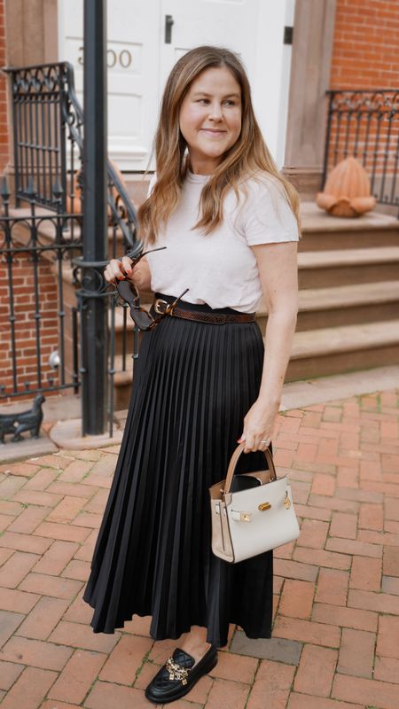 If you need a work outfit or a weekend outfit on a hot day, go for a linen top with a pleated skirt! I love to pair this super feminine outfit with loafers. My belt is gifted.

#LTKWorkwear #LTKStyleTip #LTKSeasonal