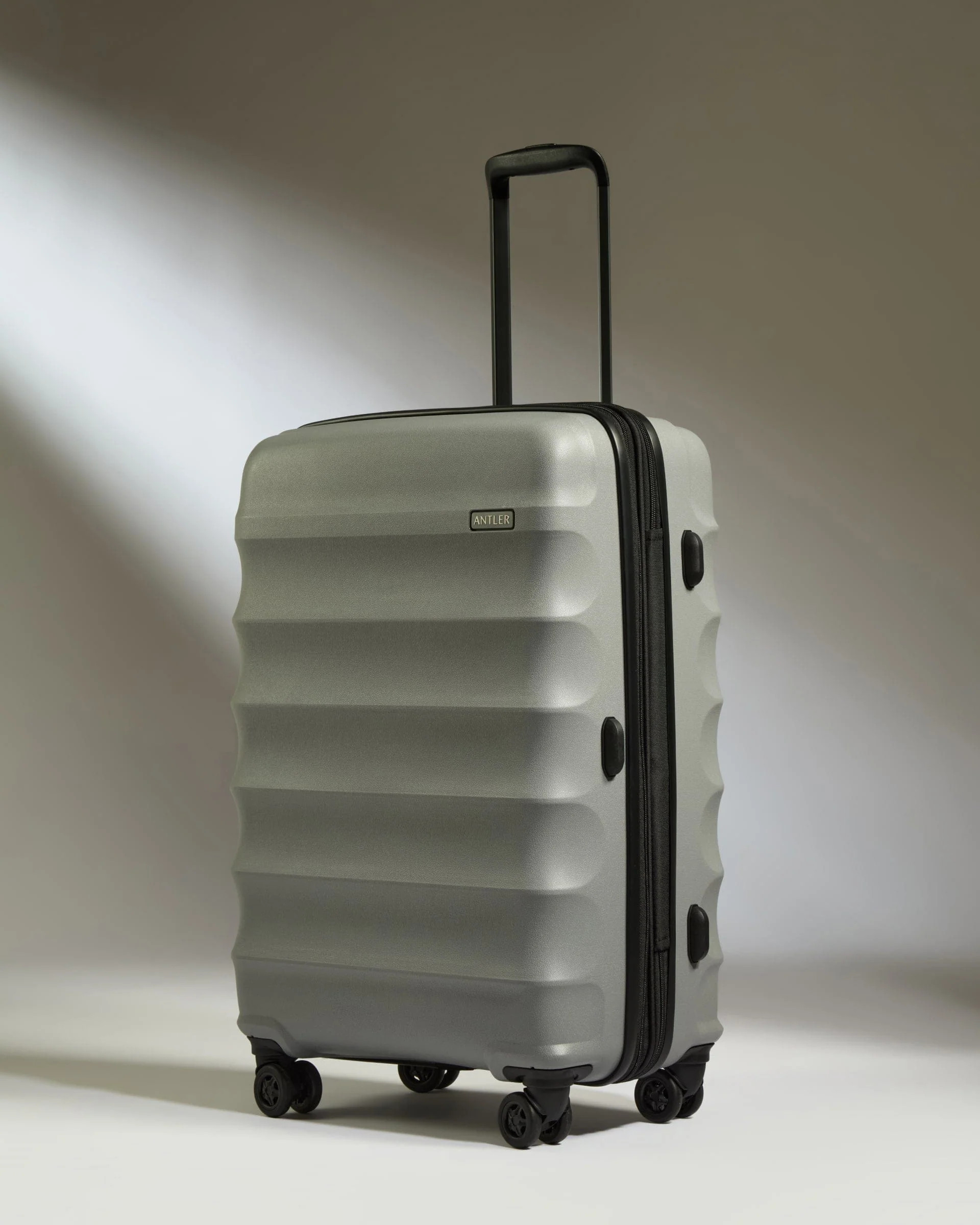 Medium Suitcase in Grey - Juno | Checked Luggage & Medium Suitcases | Antler UK