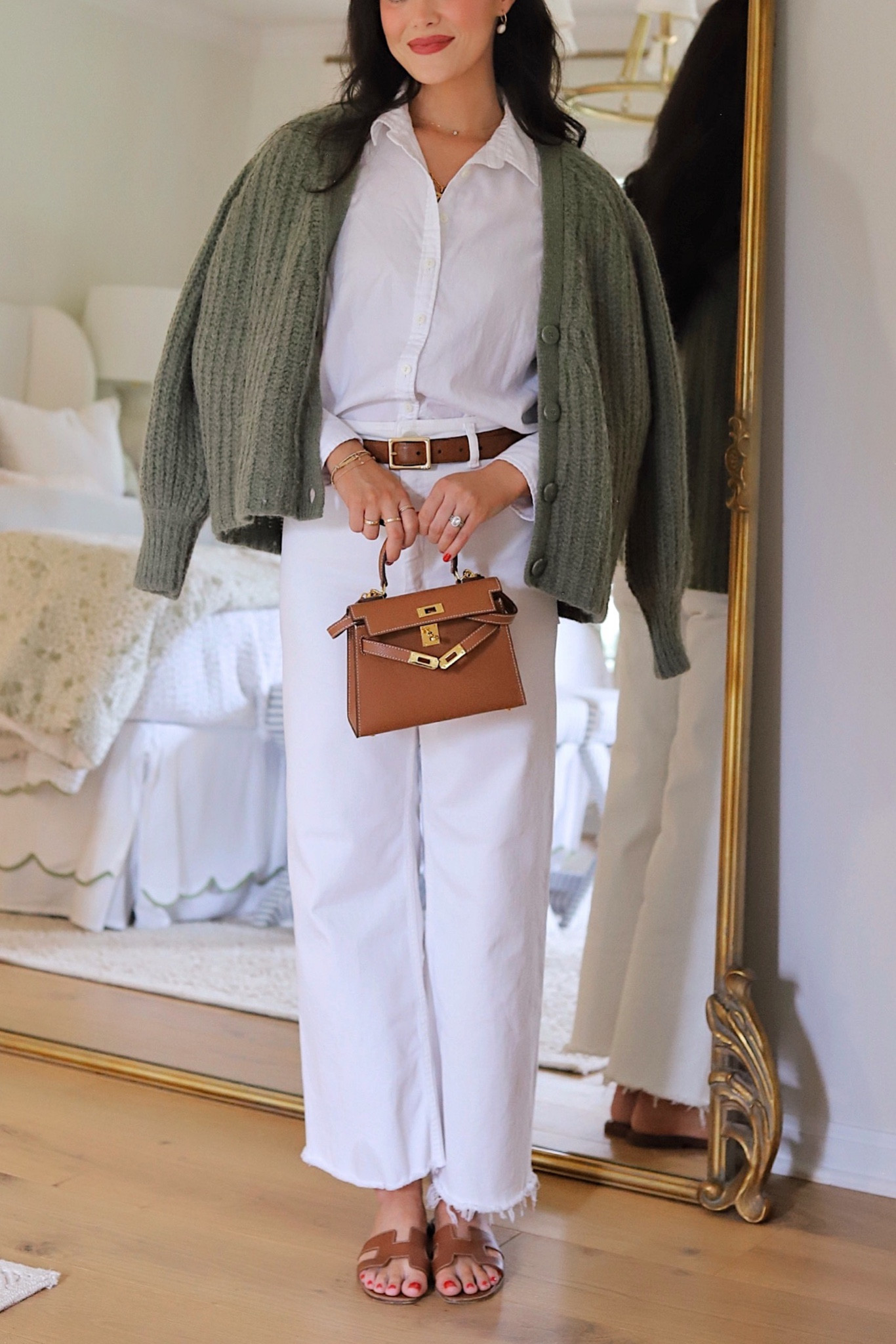 Classic spring outfit / green Sezane cardigan / white denim jeans / Hermes sandals 