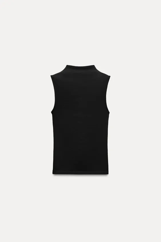 Top made of cotton and modal blend fabric. Sleeveless design with high collar. | Zara US