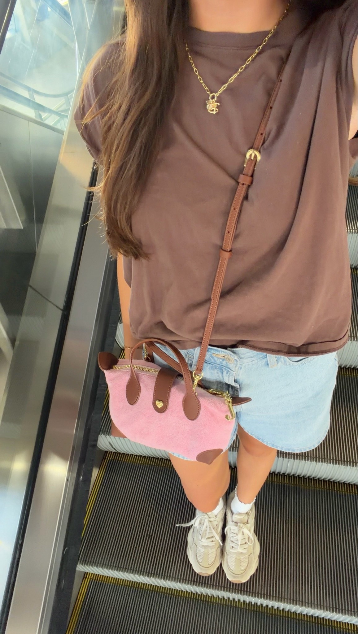 Comfy casual ootd🤍 basic tee with jean shorts, old navy 5 inch inseam denim shorts, nuuds brown muscle tee, juicy couture x Stoney clover lane pouchette crossbody purse, Reebok chunky sneakers, ruffle socks, Kendra Scott necklace, Amazon sunglasses

#LTKootd #LTKdayinmylife #LTKSaleAlert
