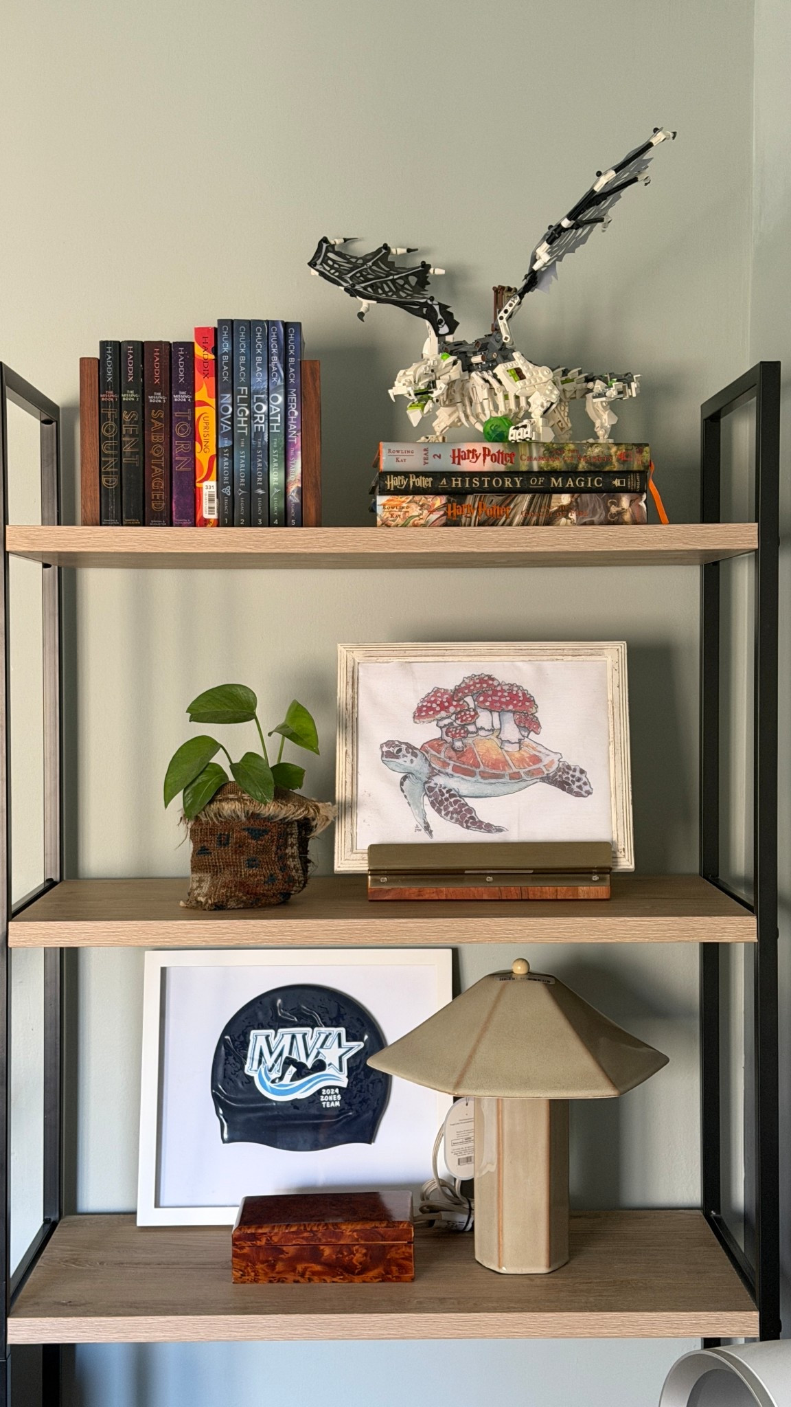 Working on kids decor today and specifically on shelf styling. I love using cookbook holders displaying open books or art on shelves. 

#LTKKids #LTKHome #LTKFindsUnder50