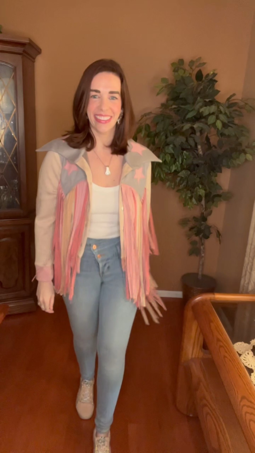 Star fringe suede jacket (small). White tank (small). Light wash mid rise skinny jeans (4). Pink suede sneakers (8.5). #jacket #suedejacket #fringejacket #starjacket #tank #whitetank #skinnyjeans #jeans #midrisejeans #lightwashjeans #sneakers #pinksneakers #suedesneakers #springoutfit #summeroutfit Spring Outfit 
Summer Outfit 
Country Concert Outfit

#LTKSeasonal #LTKFindsUnder100 #LTKStyleTip