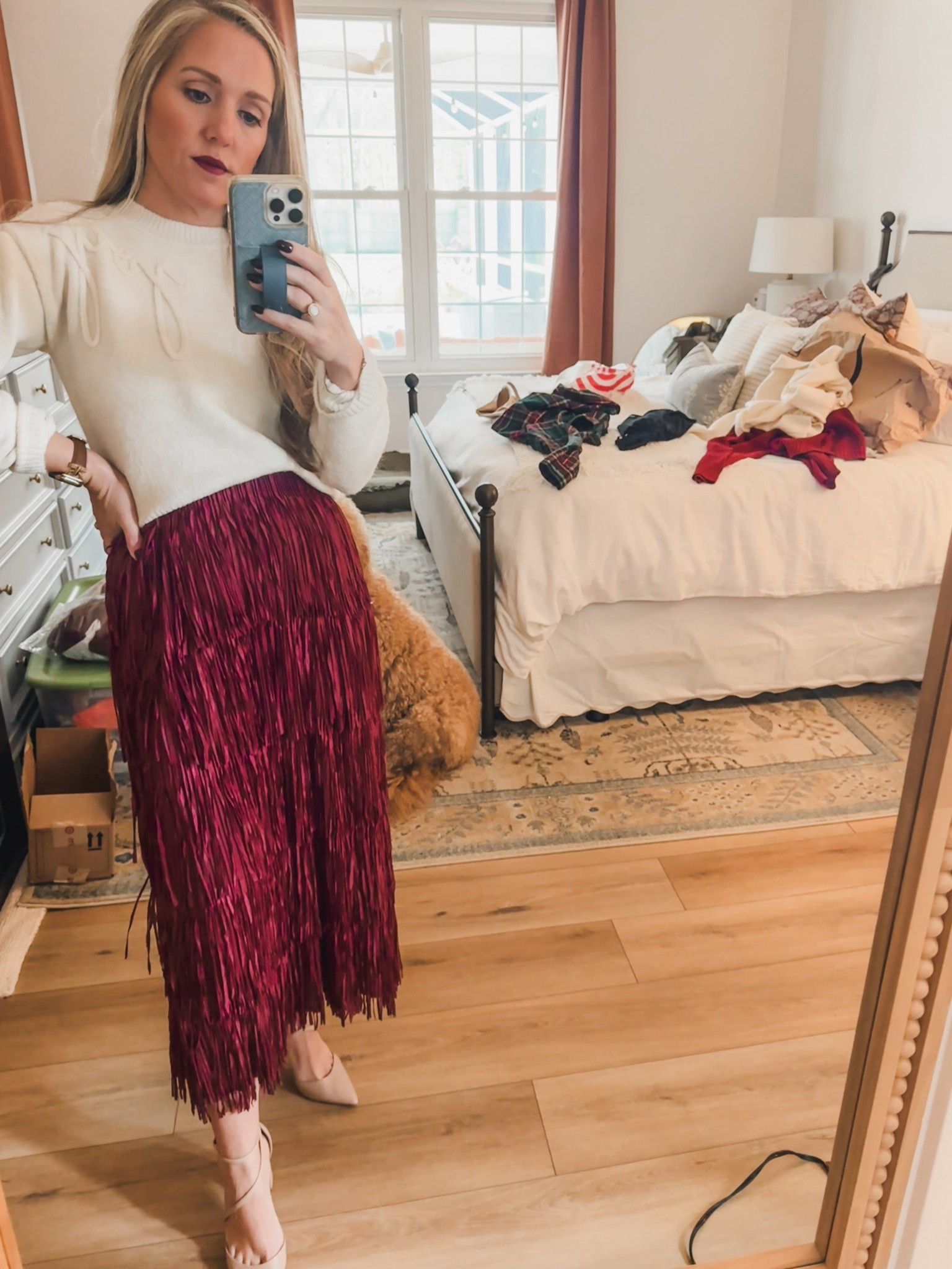 Anyone else’s room look like this when you’re getting ready to go somewhere!? That’s about 4 outfits that didn’t make the cut over there! I’m obsessed with this fringe skirt I found from Amazon. It comes in several colors and now I want them all! And the coziest Target sweater to go with it! 

#LTKHoliday #LTKootd