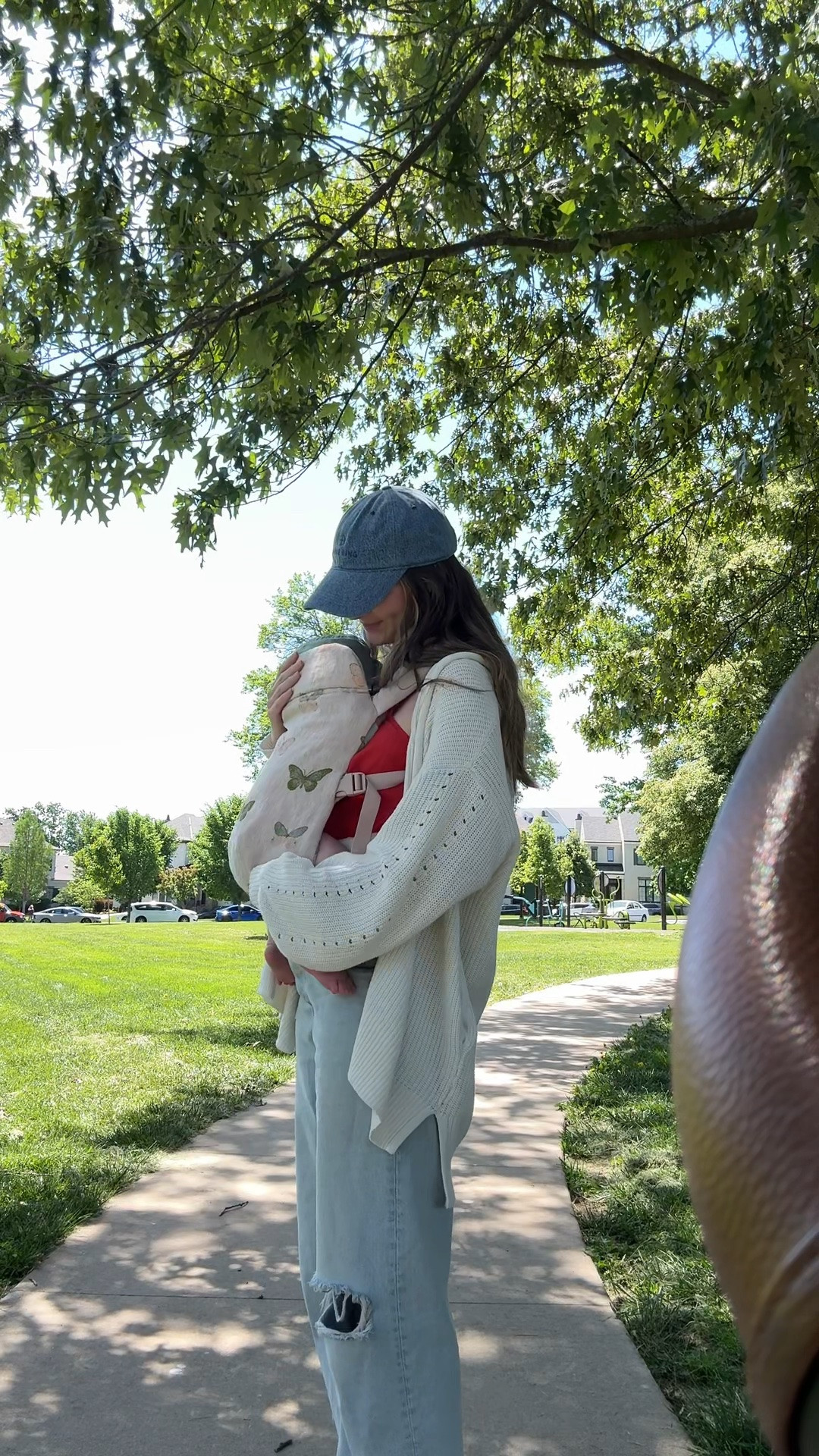 favorite baby carrier! wearing a medium in red tank and sized up 2 in jeans postpartum

#LTKootd #LTKmomlife #LTKMothersDay