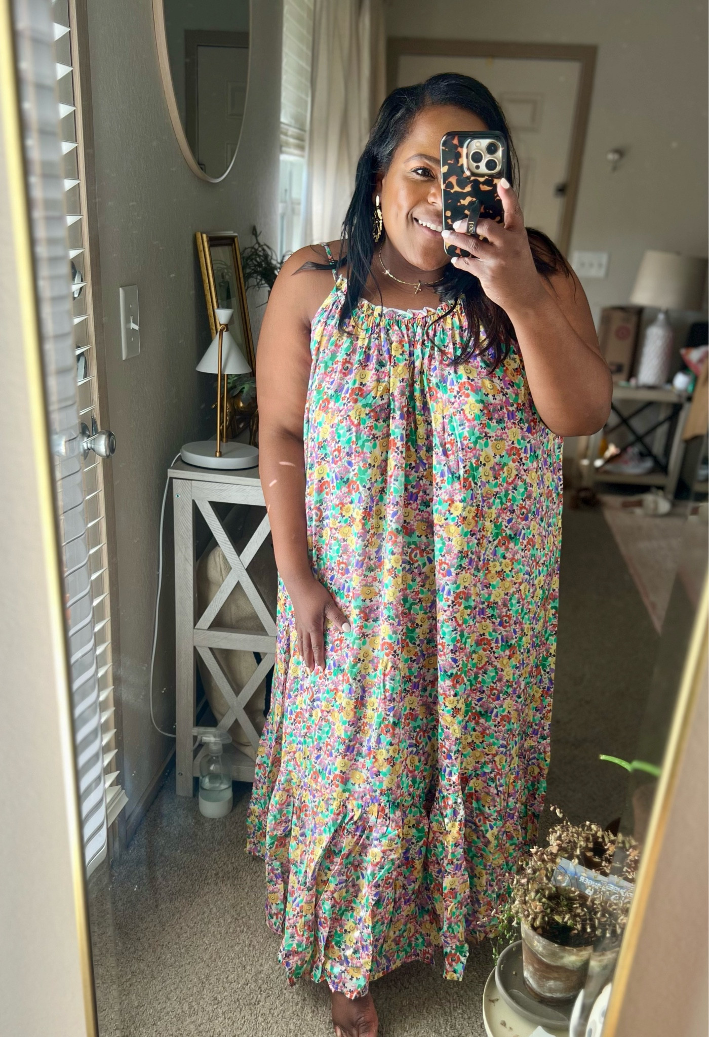 The most comfiest throw on dress from Anthropologie for under $60 on sale. I’m wearing the size large petite so be sure to side down. Also wear a bandeau bra because the back of the dress dips a little low but perfect for weekends and to the beach 🏖️ @leliassoutherncharm 

Summer dress / vacation / maxi dress / florals 

#LTKTravel #LTKSaleAlert #LTKFindsUnder100