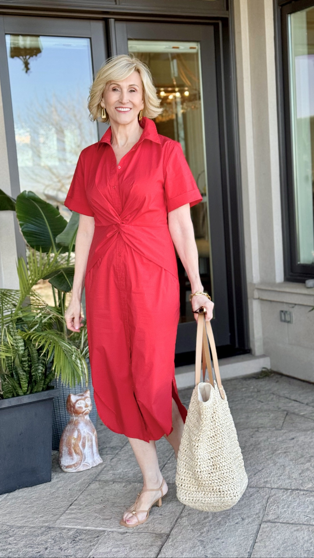 You know how some dresses do all the work for you? This red shirt dress  is one of them.

I’ve always loved a great shirt dress because it’s timeless, flattering, and so easy to wear, but the twist detail at the front takes this one to the next level. It creates beautiful shape through the waist while still feeling comfortable and effortless—something I appreciate more and more these days!

I paired it with nude heels and a straw bag to keep the look light and summery. The neutral accessories let the gorgeous red color take center stage while adding that polished finishing touch.

One thing I’ve learned over the years is that a bold color can be incredibly uplifting. If you’ve fallen into the habit of wearing lots of black and neutrals, don’t be afraid to try a vibrant red. It instantly brightens your look, boosts your confidence, and makes even a simple outfit feel special.

#LTKOver40 #LTKSeasonal #LTKootd