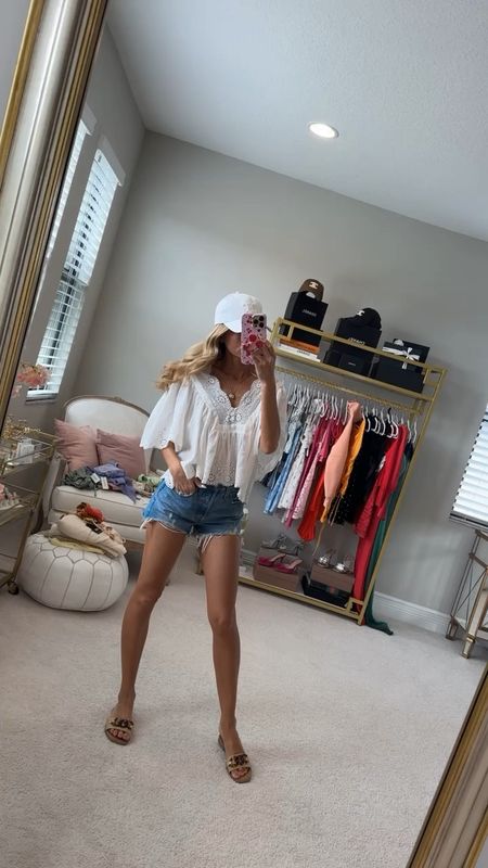 This top is perfect for spring. I’m in the xs and these are the best denim shorts. I am in the 24  