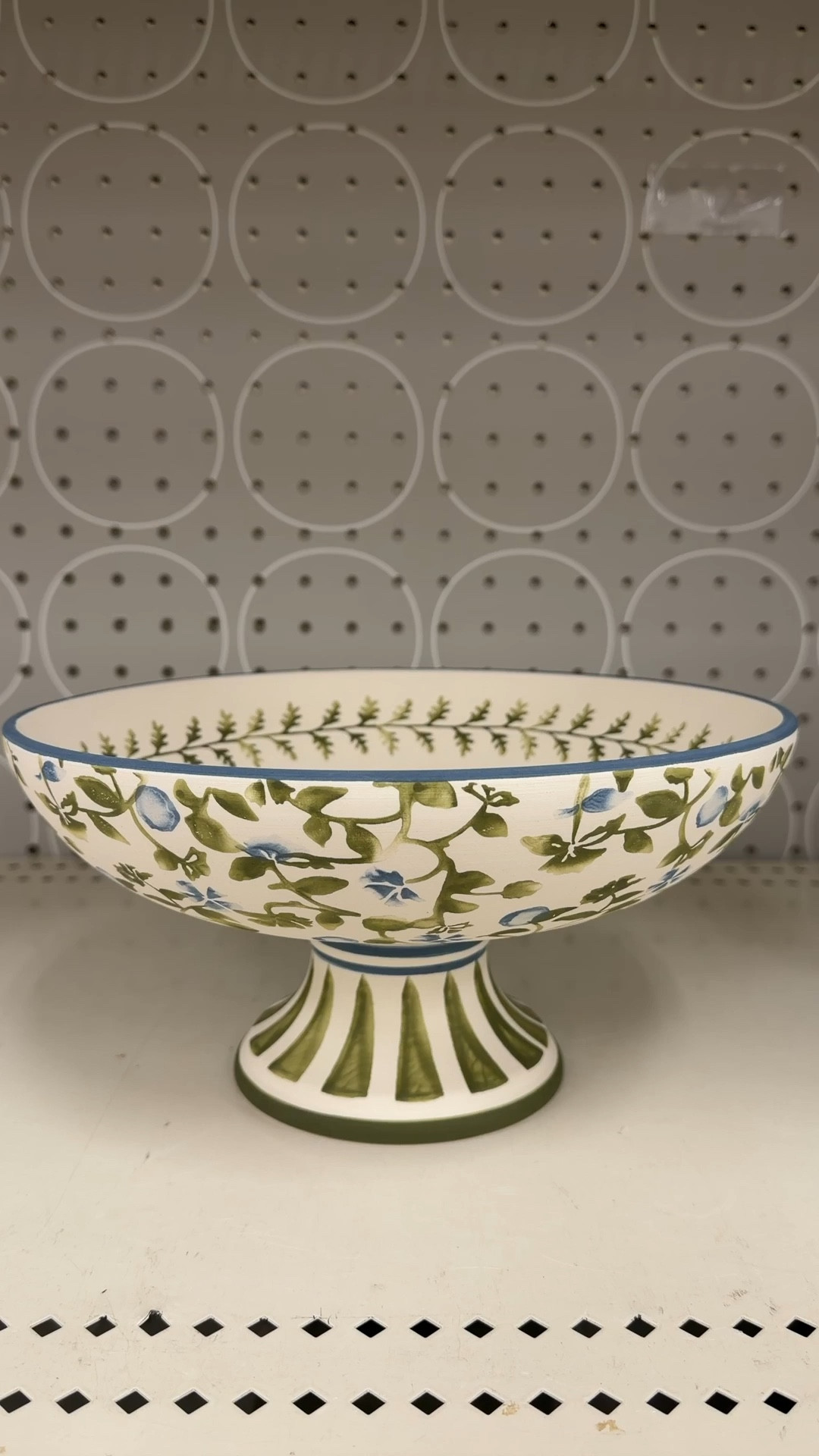 Such a pretty tabletop accent! 💙 The 10” Floral Painted Ceramic Footed Bowl from Target features a charming green floral pattern with a blue rim, giving it that classic, designer-inspired look. 🌿 The footed shape adds a nice elevated touch, making it perfect styled on a coffee table, console, or shelf. 🫶🏻 A beautiful decorative bowl for holding small items or simply displaying on its own. Linked it here! ✨ #TargetHome #HomeAccent #HomeDecor

#LTKSaleAlert #LTKHome