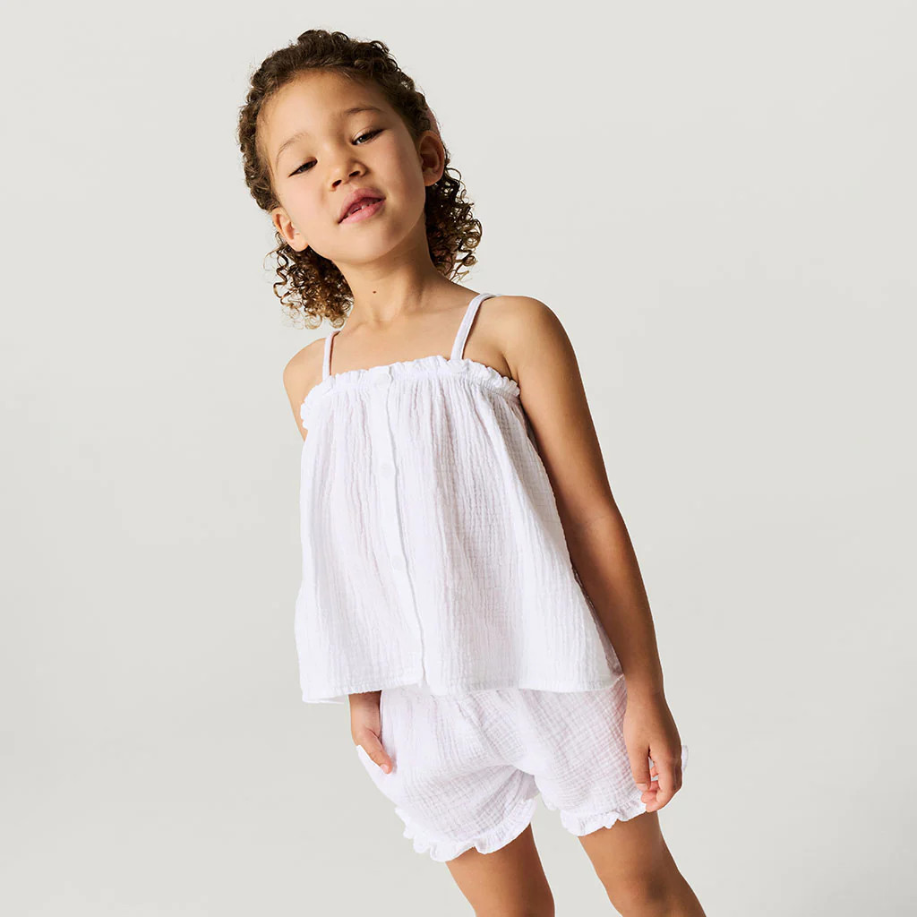 Solids White Relaxed White Cotton Crinkle Ruffled Shorts | Posh Peanut® | Posh Peanut