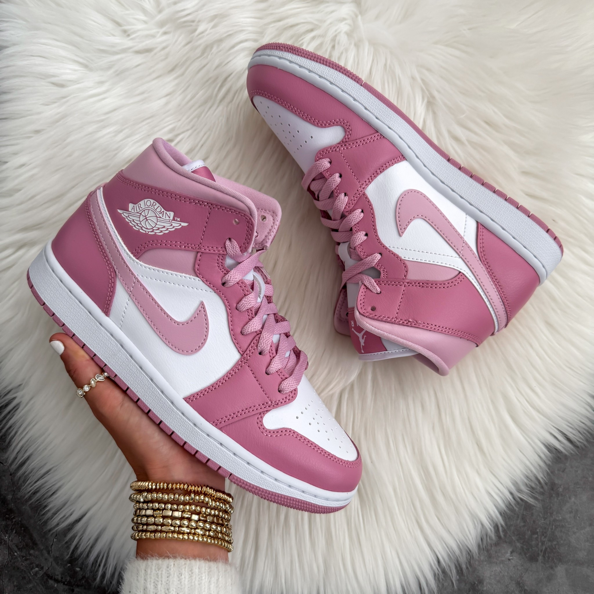 Women’s Air Jordan 1 Mid in pink runs true to size 