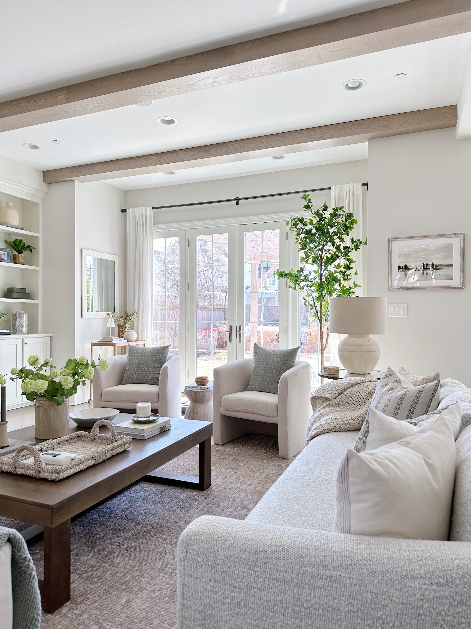 Living room spring home decor!! Keeping it light and bright with these pretty new Target chairs and amazing new faux tree!! It’s a splurge but love it so much! 

#homedecor #livingroom #springdecor

#LTKhome #LTKSeasonal