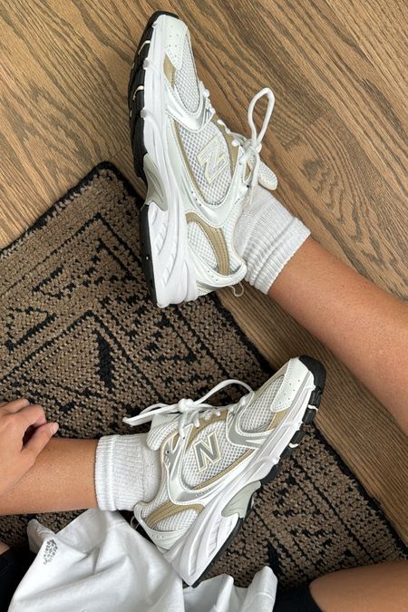 The perfect neutral sneaker for spring! Love the silver in these sneakers and all the tans make them go with everything! They fit true to size!! New balance sneakers for spring 

#LTKfindsunder100 #LTKshoecrush #LTKSeasonal
