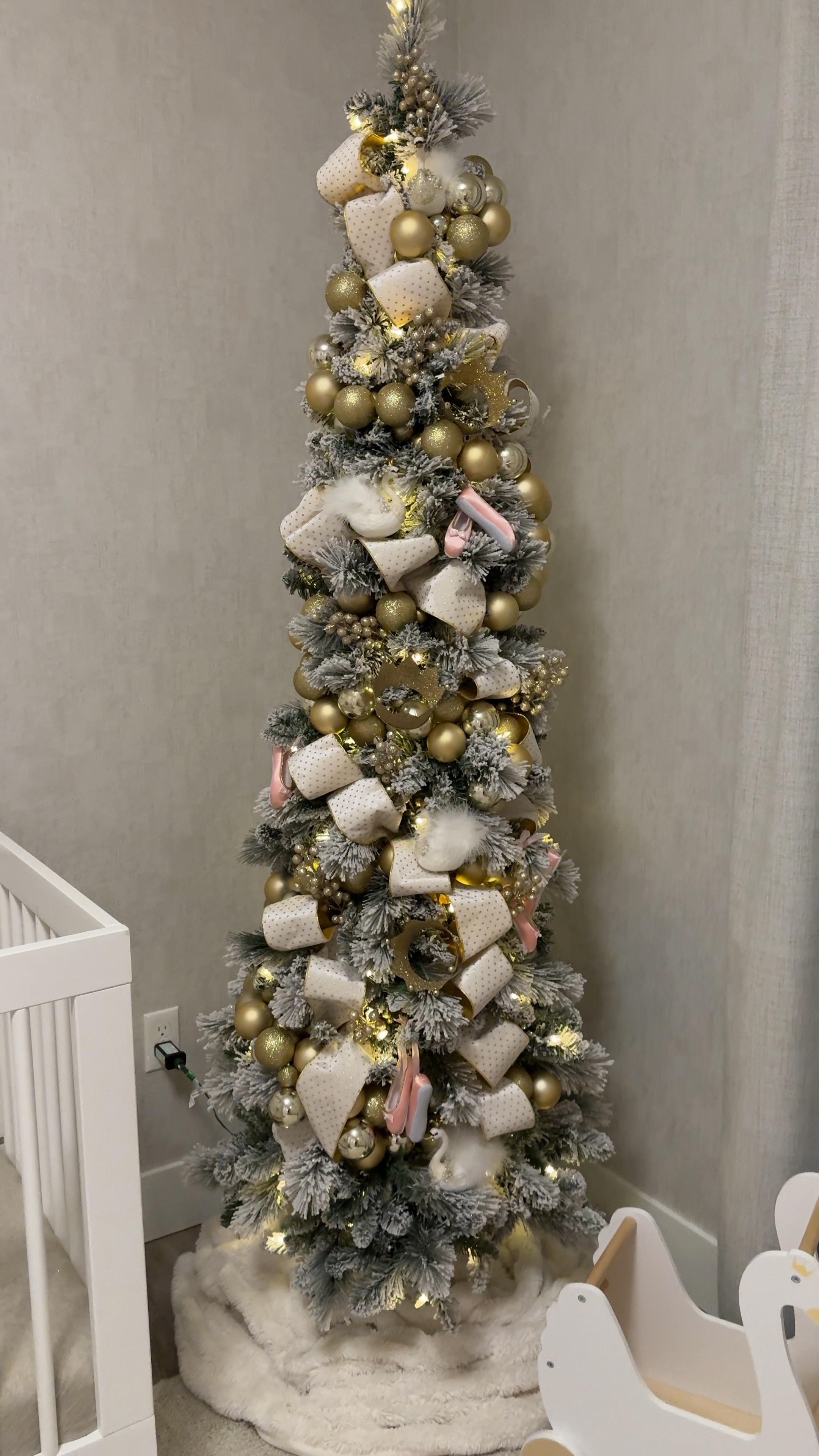 olivia’s nursery kids tree 
i used two of the ball garlands and two rolls of the ribbon for this tree 

flocked christmas tree
kids christmas tree
christmas tree


#LTKHoliday #LTKSeasonal #LTKVideo
