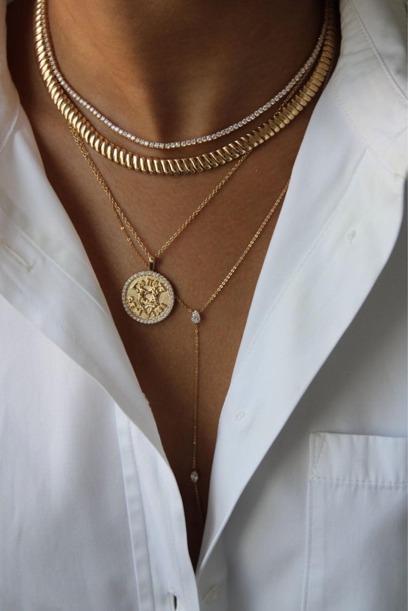 Layered necklaces ⚡️ the more the merrier. Quick way to dress up your look!
• 
•
•
•
Gold, silver, Diamond, choker, pendant, 14k gold, y-necklace, snake chain, zodiac sign, zodiac pendant, evil eye, dainty jewelry, accessories,outfit, ideas, Inspo, tennis bracelet, tennis necklace, jewelry stack, necklace stack, fall look, fall inspo, weekend style  

#LTKwedding #LTKstyletip #LTKworkwear