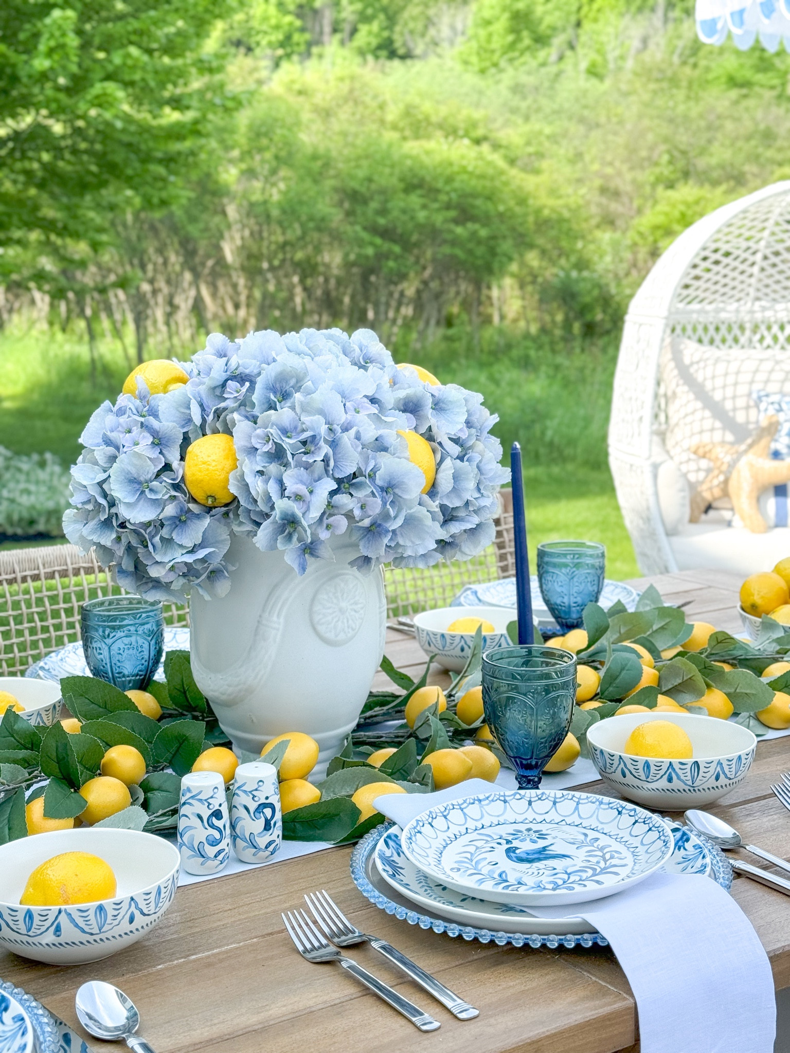 Shop my Amalfi Coast themed summer tablescape 🍋💙🩵💛

Blue hydrangeas, coastal decor, lemon decor, blue and white decor, blue and white plates, Fitz and Floyd, classic style, traditional style, lemon branch stems, Anduze planter, white planter, blue goblets, outdoor dining, outdoor entertaining, blue linens, outdoor table, patio decor

#LTKHome #LTKSeasonal #LTKFindsUnder100