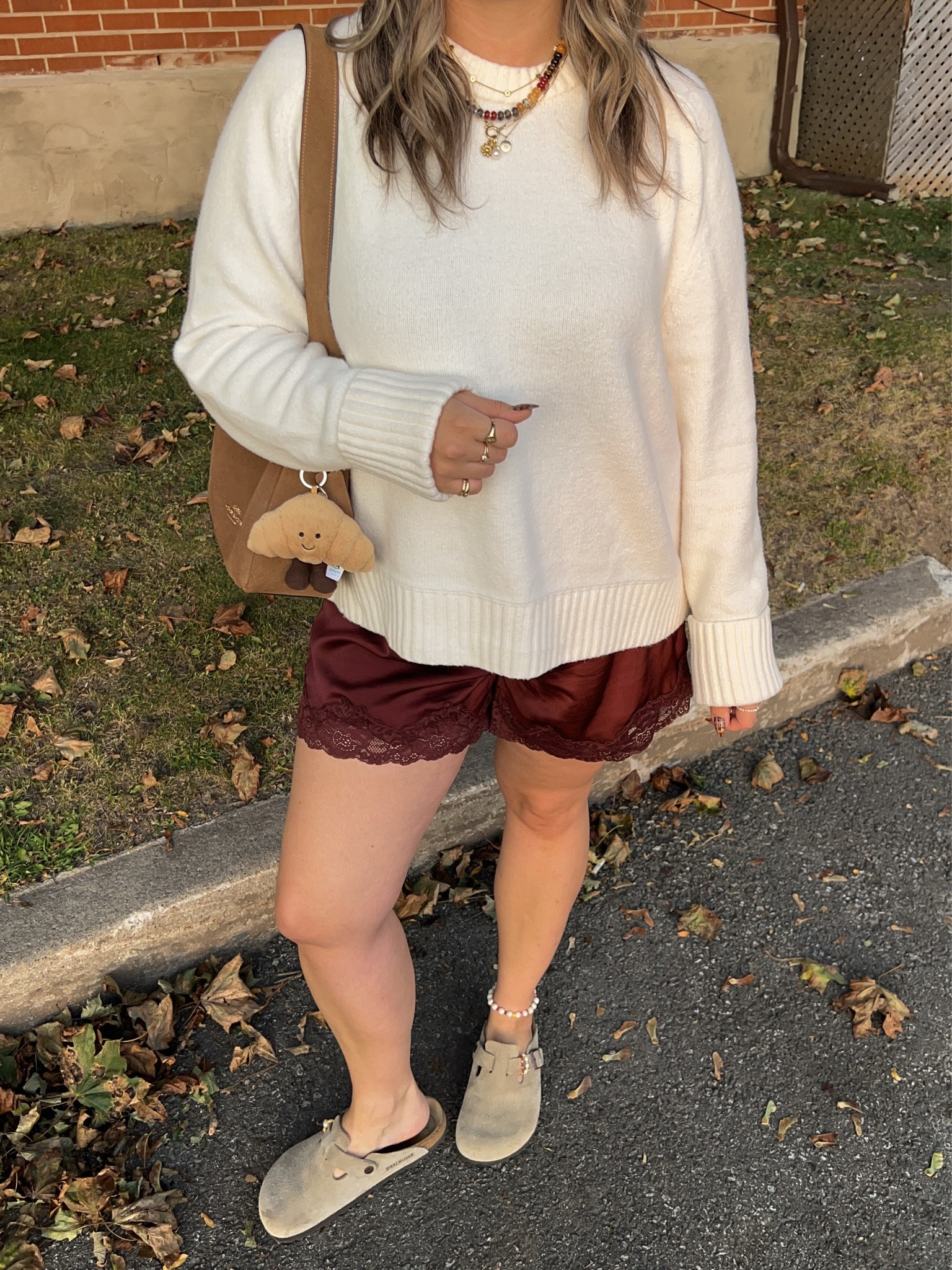 Comfy early fall outfit! Sized up to XL in the sweater for an oversized fit. Wearing M in the satin lace shorts. I’m a 9.5-10 shoe and wear a 40 in the Birkenstock clogs

#LTKfall #LTKsale #LTKstyletip