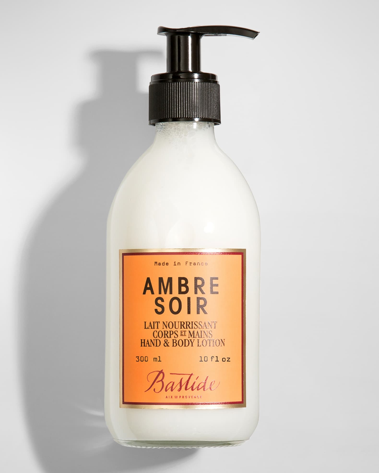 10 oz. Ambre Soir Hand and Body Lotion | Neiman Marcus
