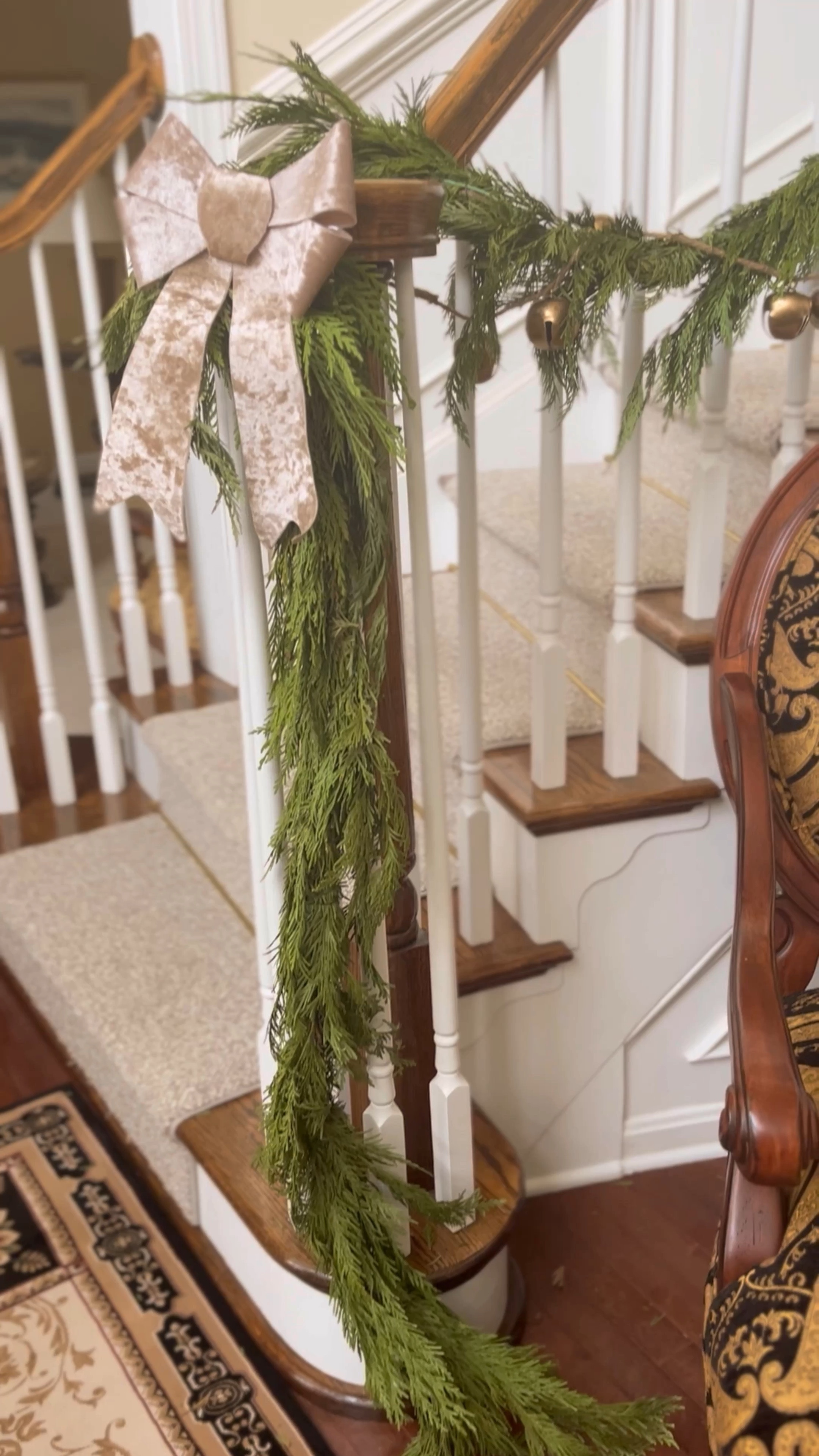 Staircase garland 
Holiday staircase decor inspo 
Live garland inspo 

#LTKhome #LTKHoliday #LTKSeasonal