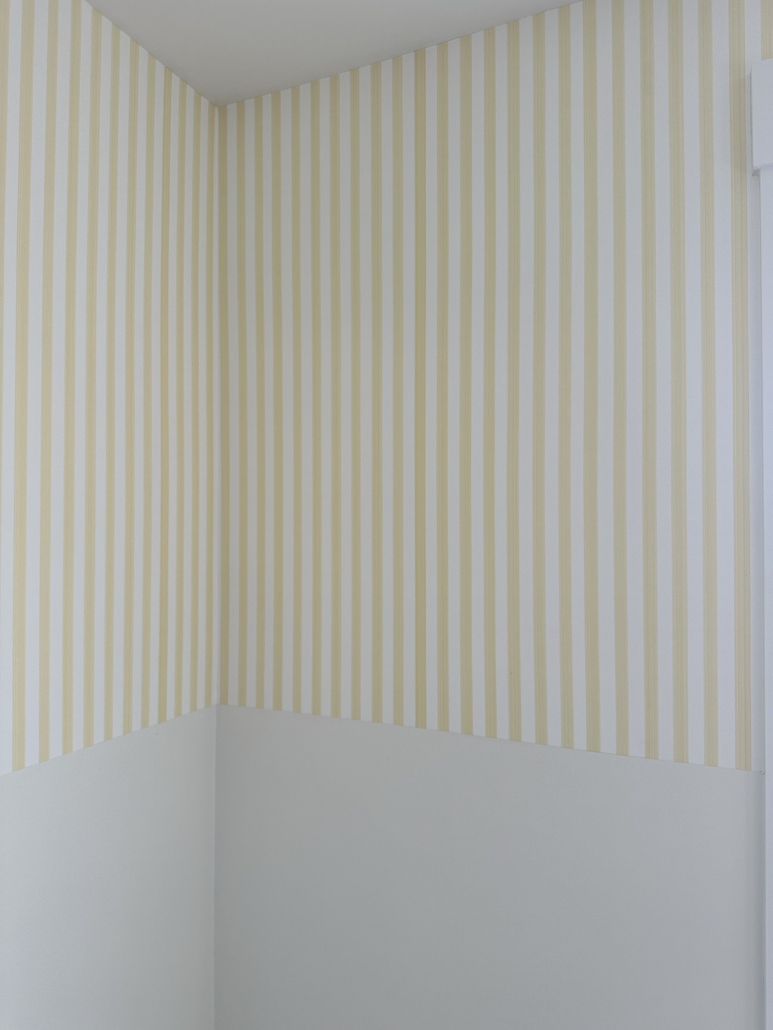 Yellow pinstripe nursery wallpaper!

#LTKhome