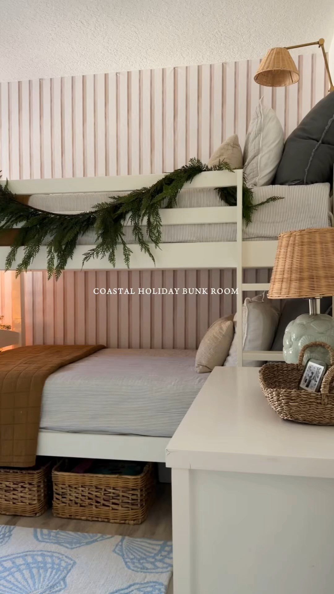Our coastal Christmas bunk room 🎄🐚

You can use my code for the woven shades it also stacks with other sales. Here is exactly what I ordered they are so easy to put up they just snap into place no tools required 
• Elevated Coastal Woven Wood Shades
• Color: Serenity Sand
• Mount Type: Inside
• Lift Style: Cordless Lift
• Valance: 6" Valance
• Built-in No-Drill design